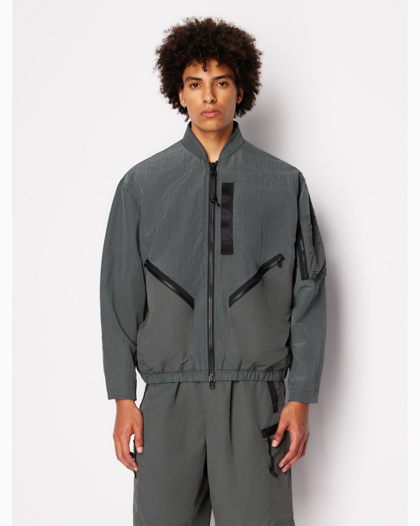 Non-woven windbreaker with hood and hook Diapositiva 1