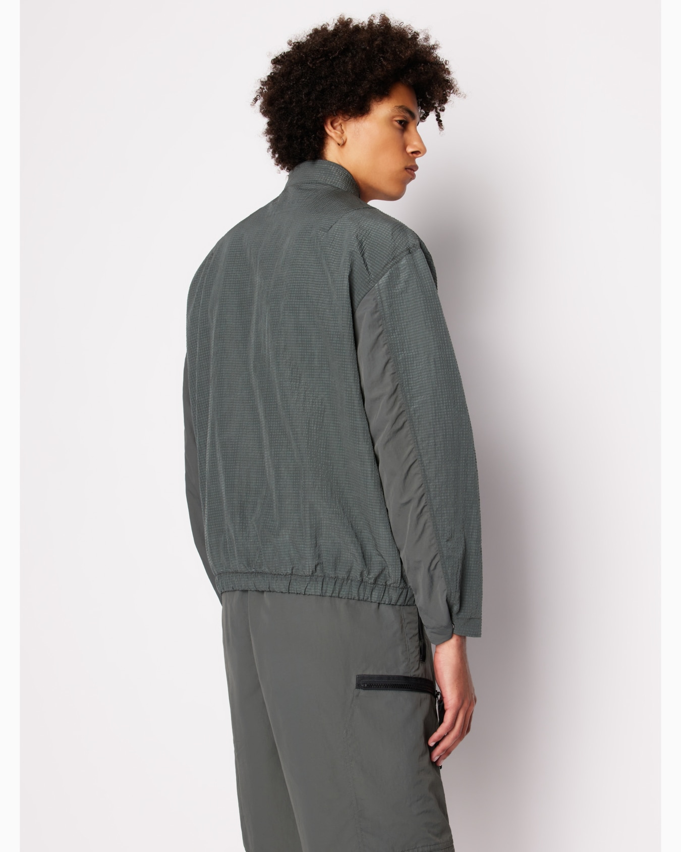 Non-woven windbreaker with hood and hook Diapositiva 2