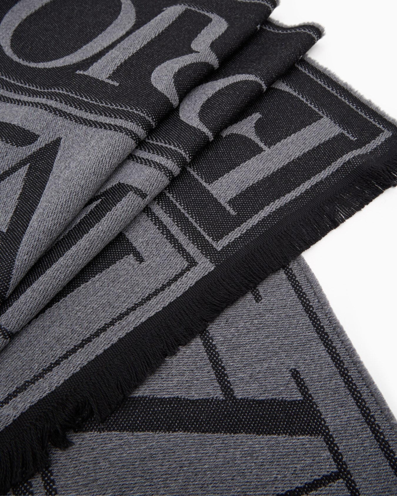 Schal aus Schurwolle in Jacquard-Stoff-Verarbeitung mit Maxi-Schriftzug Folie 1