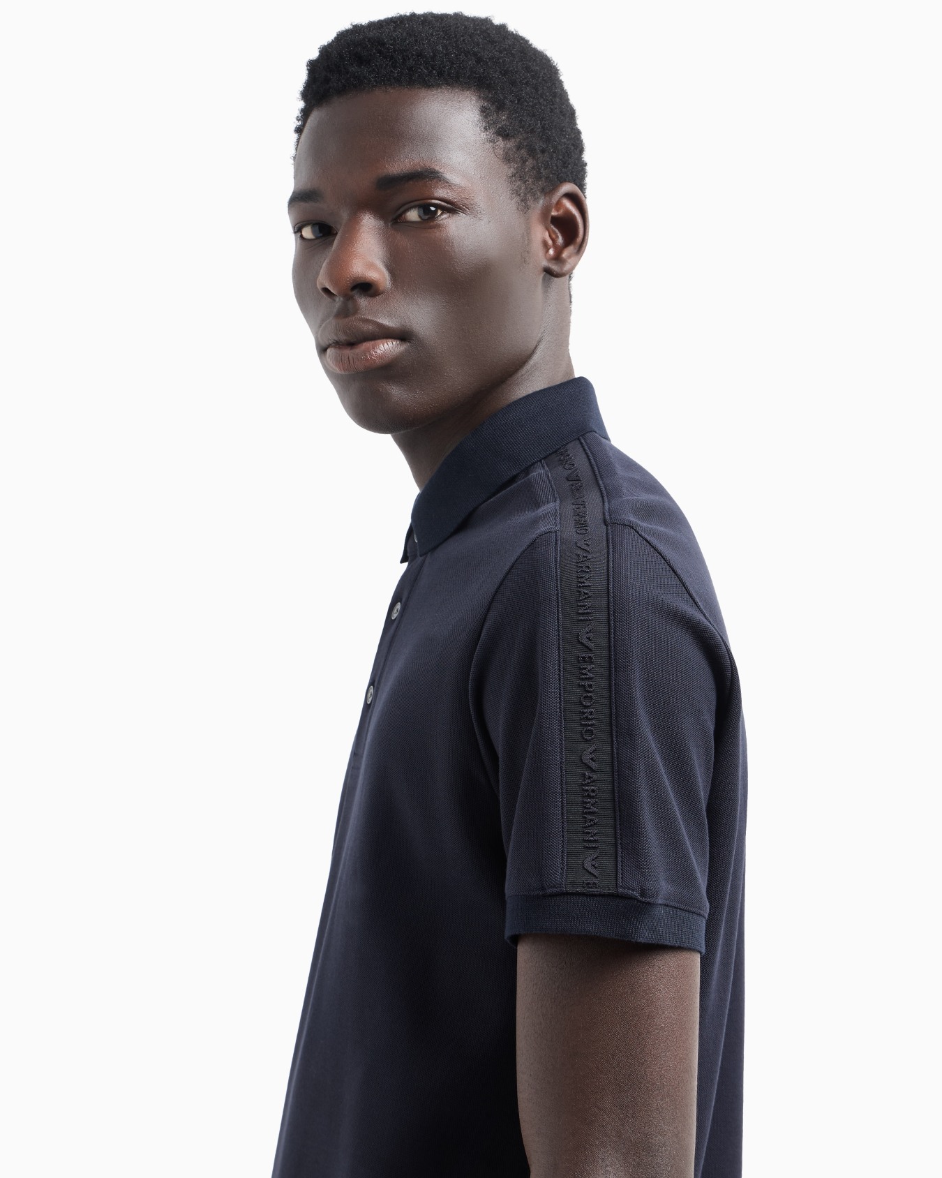 Jersey polo shirt with embossed logo tape Slide 4
