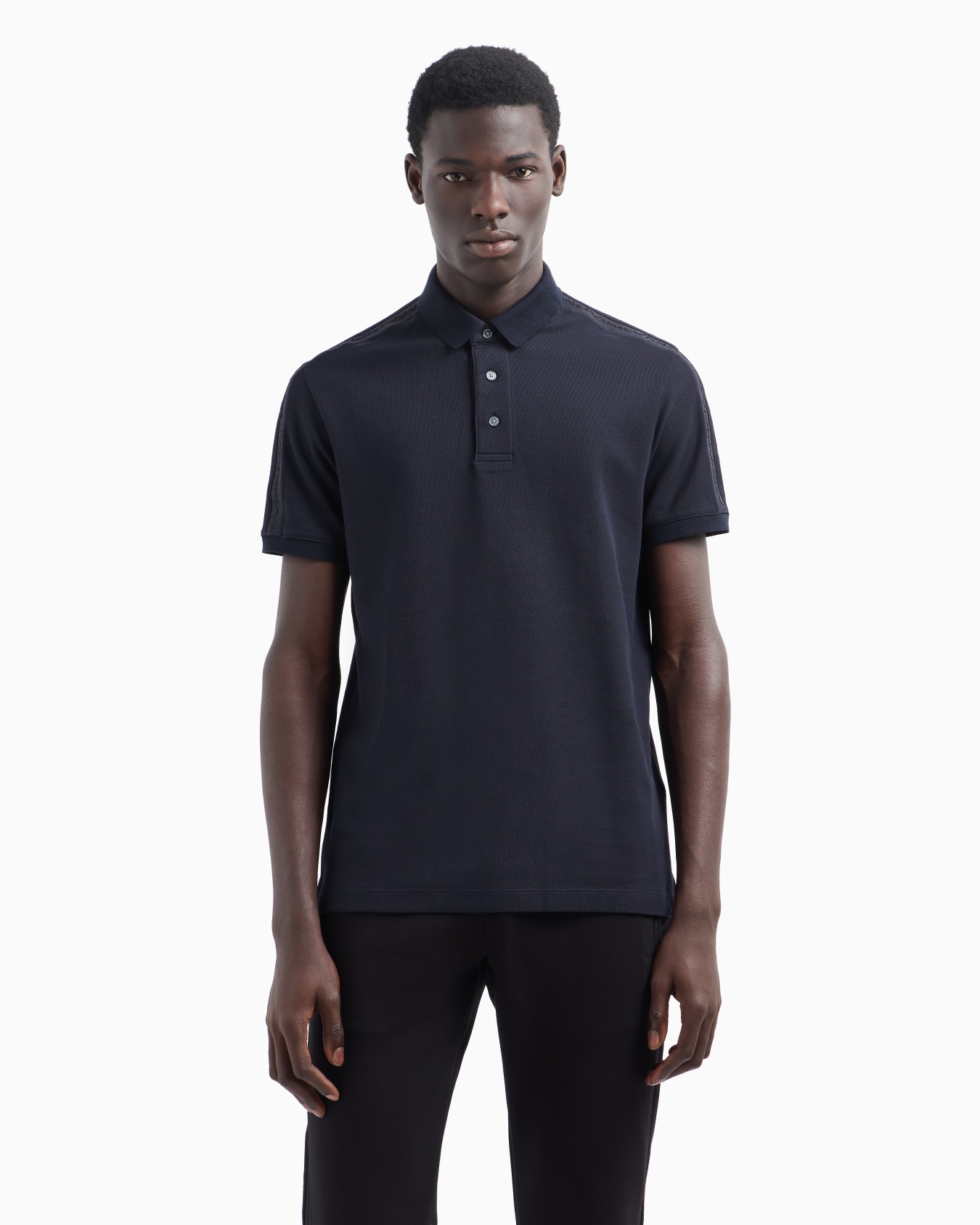 Jersey polo shirt with embossed logo tape Slide 1