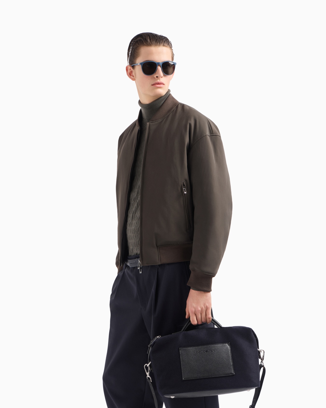 Stretch technical-nylon trousers with ankle tucks Slide 6