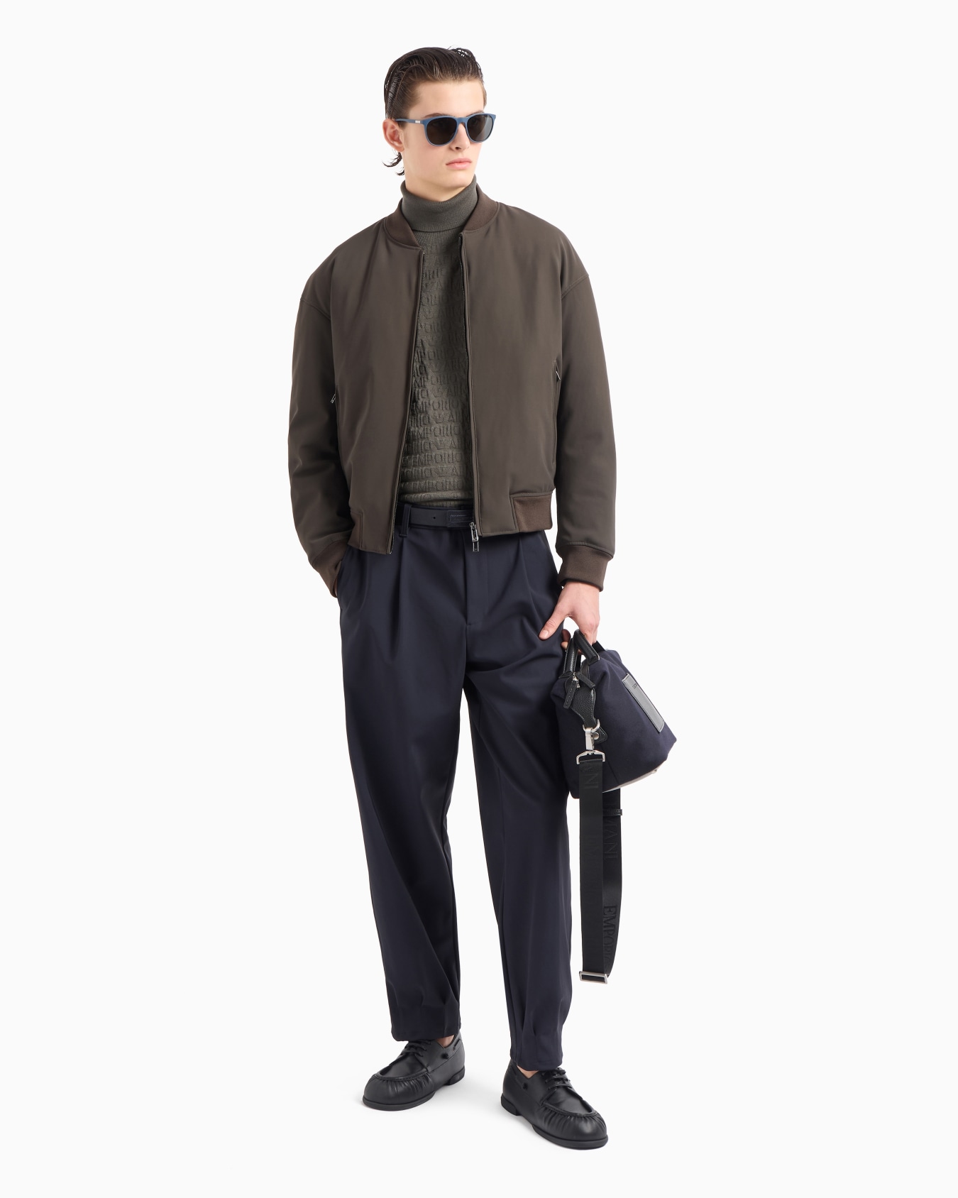 Stretch technical-nylon trousers with ankle tucks Slide 4