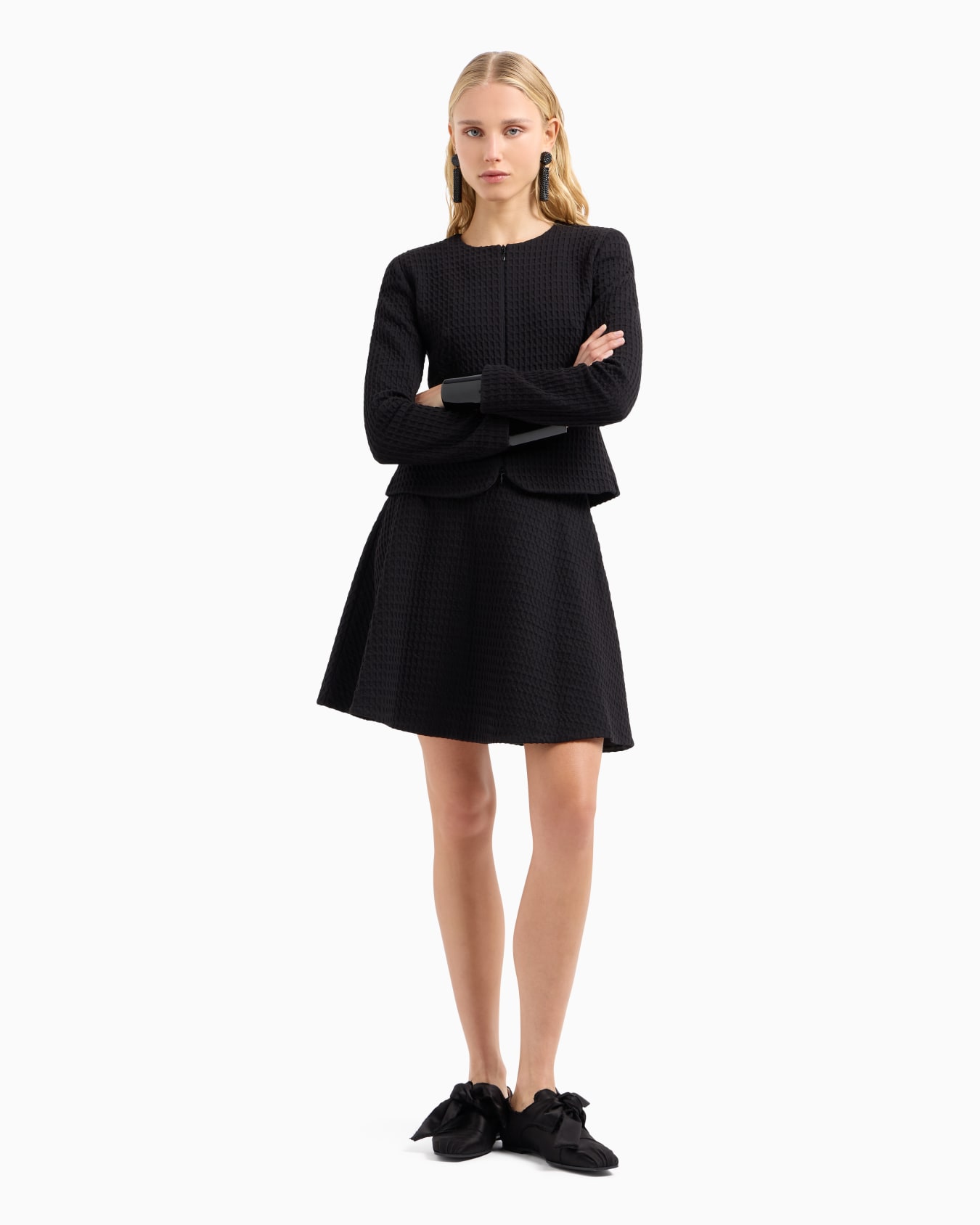 Waffle-effect knit flared skirt Slide 3