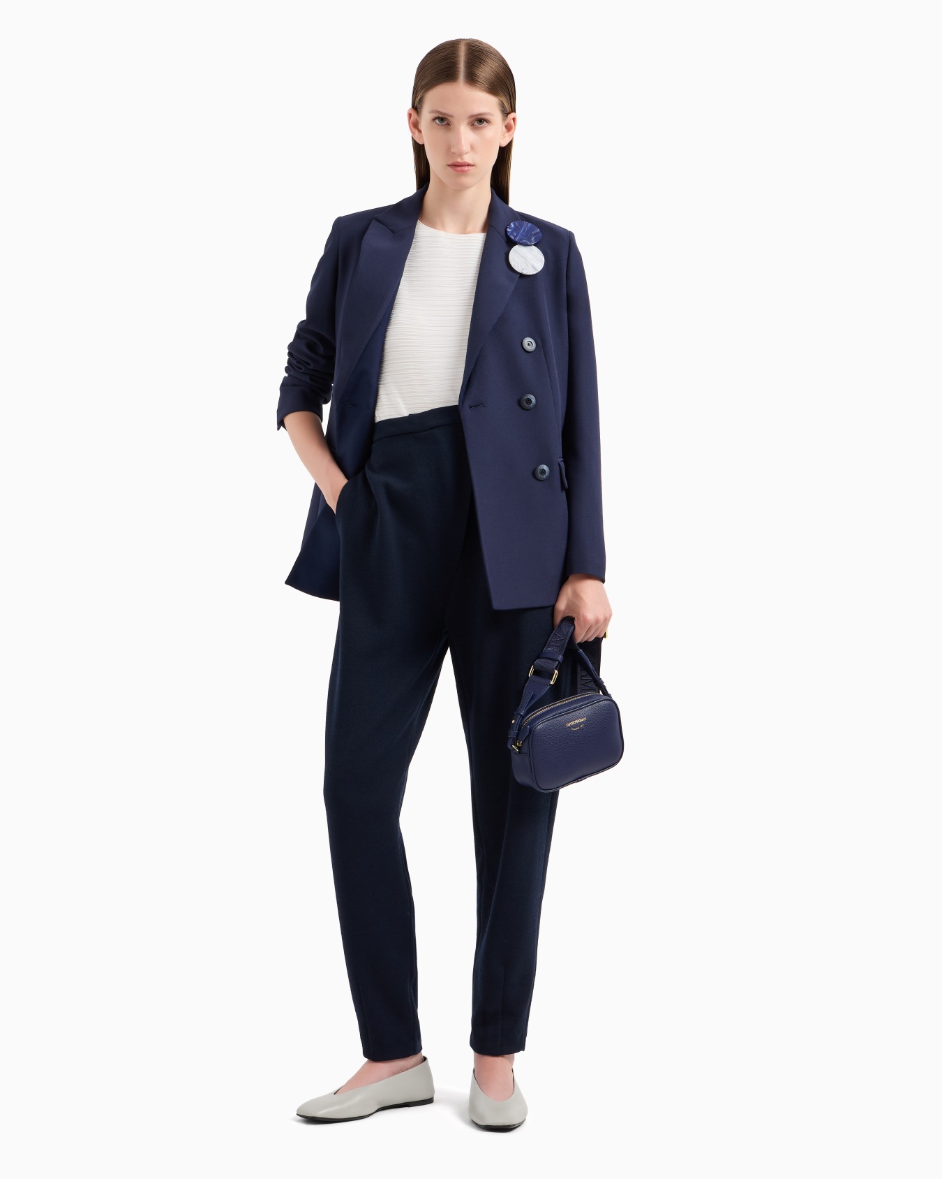 Oval-leg trousers in textured jersey with an off-centre fastening Slide 3