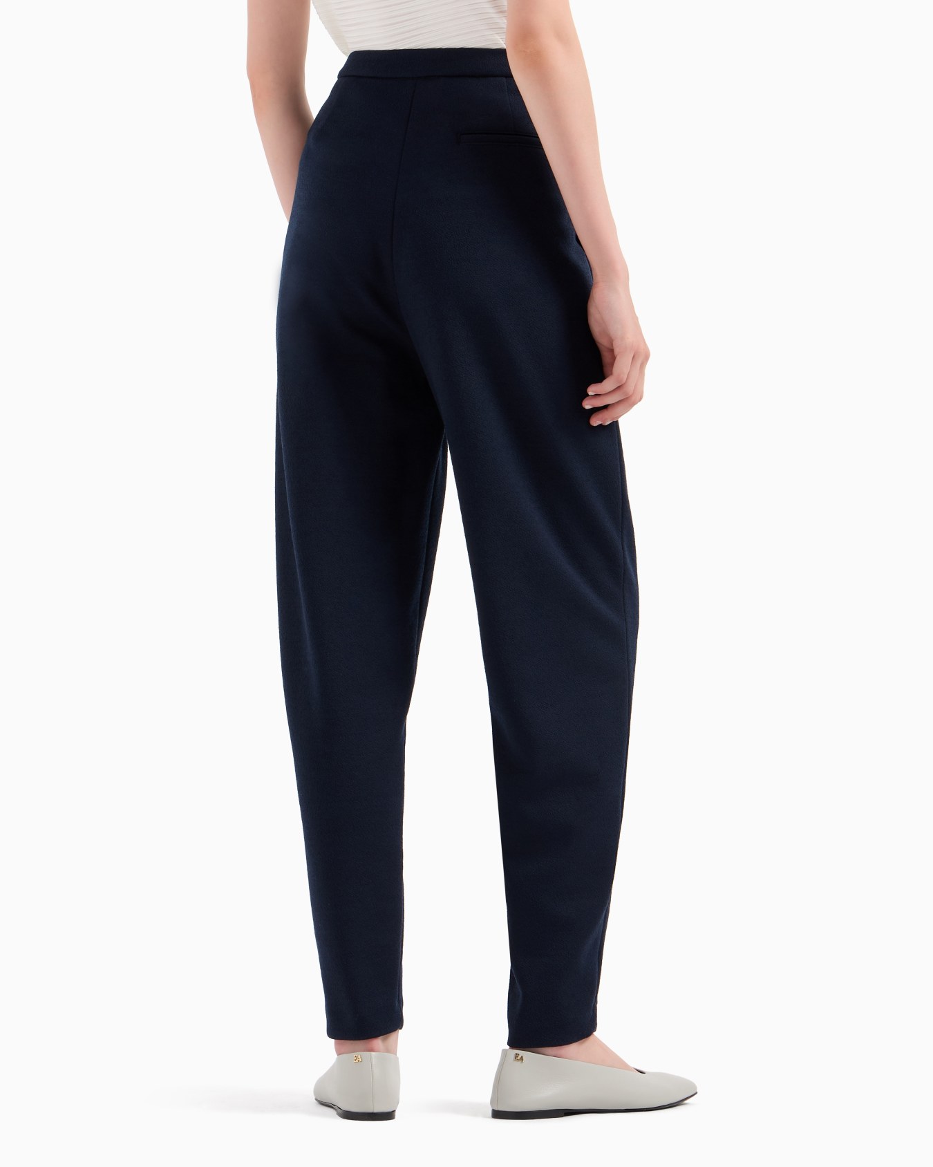 Oval-leg trousers in textured jersey with an off-centre fastening Slide 2