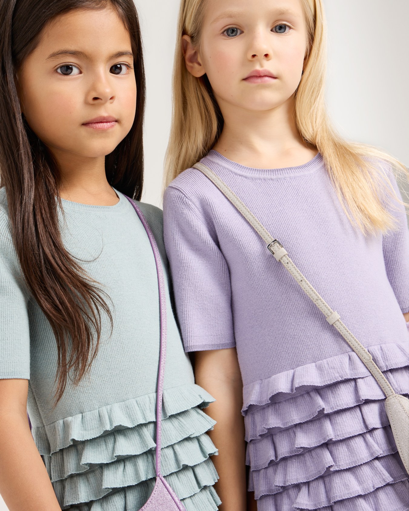 Knit dress featuring skirt with flounces and ruffles Slide 3