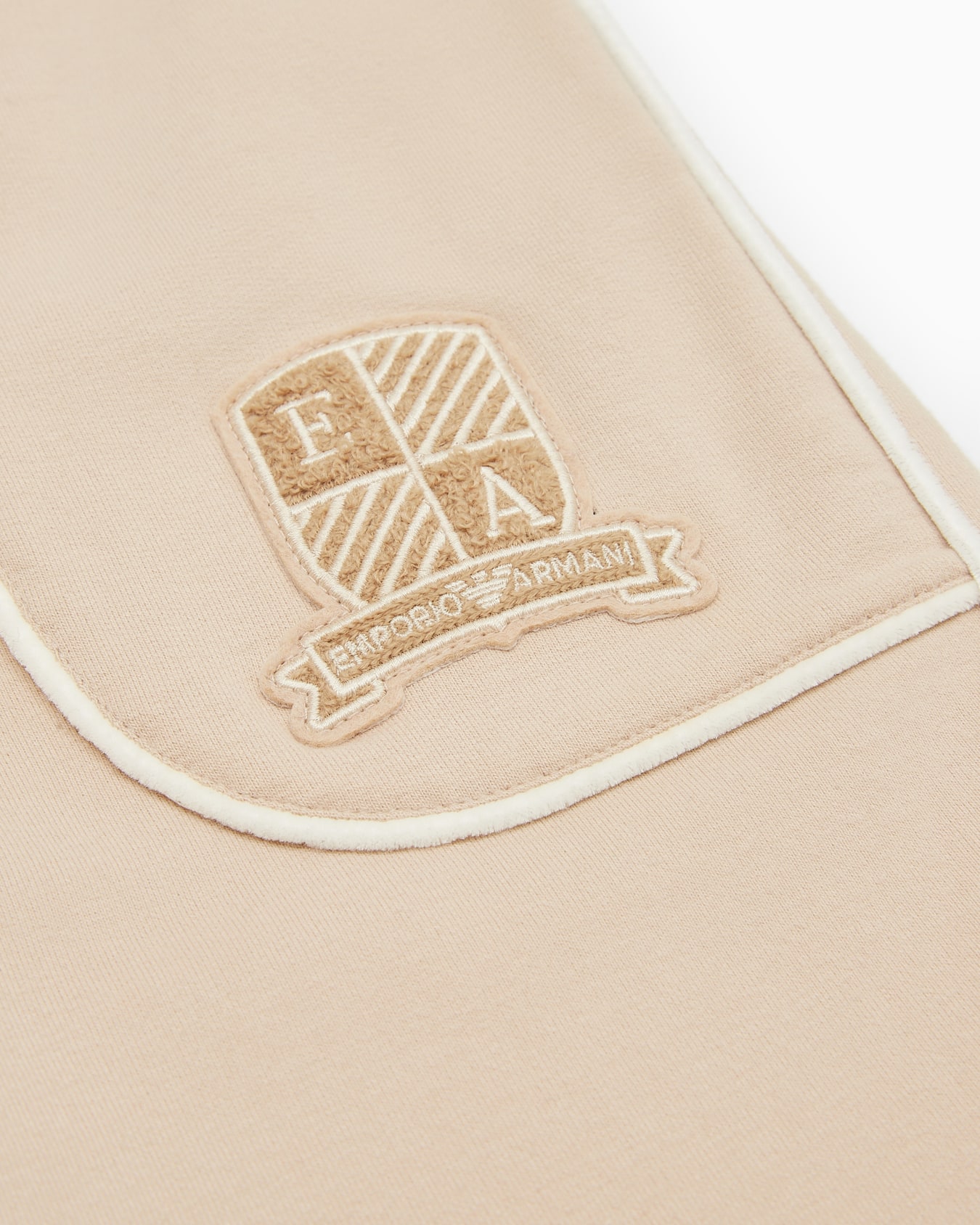 Loose-fit jersey Bermuda shorts with logo crest patch Slide 1