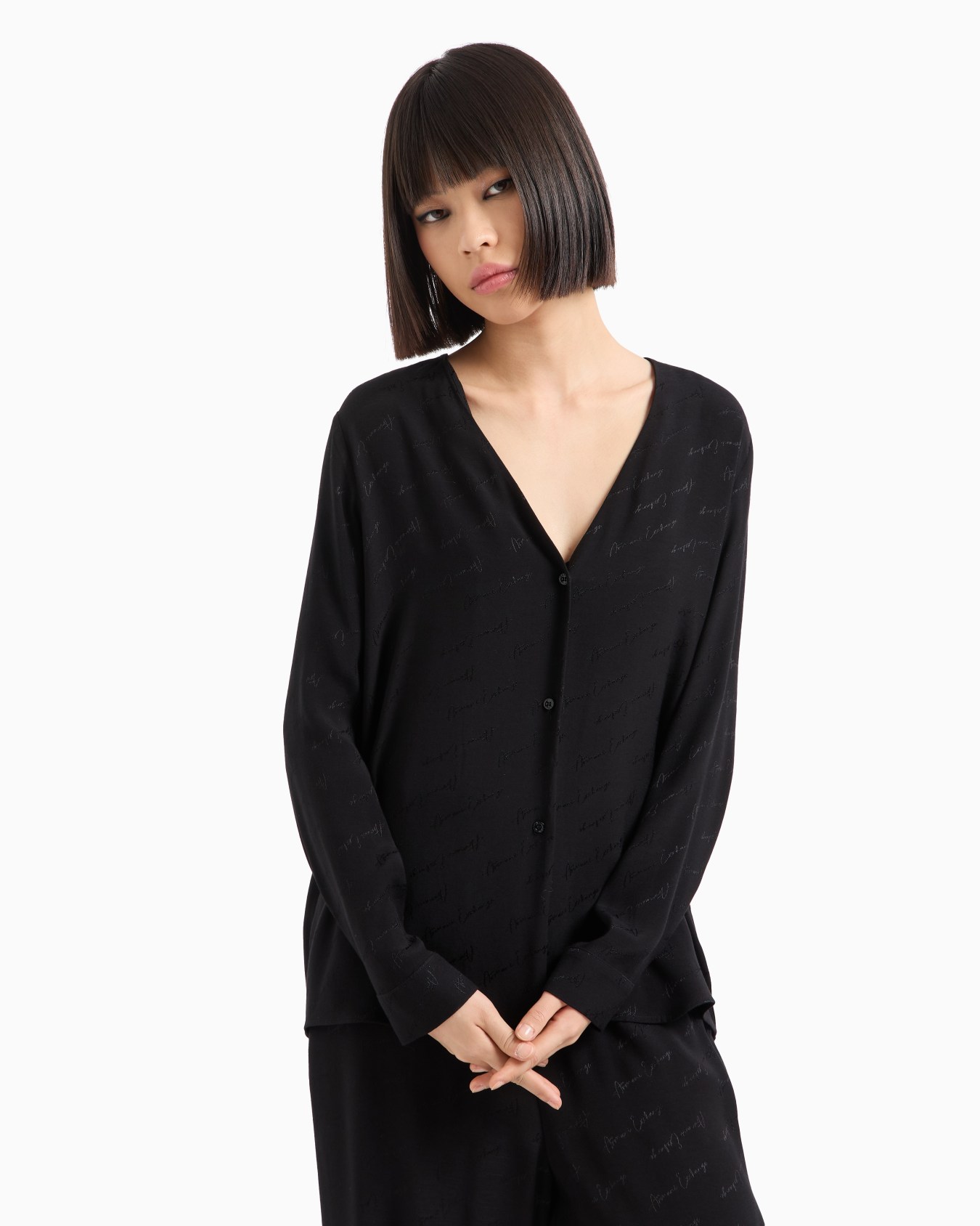 Over-fit shirt in fabric with all-over logo Slide 1