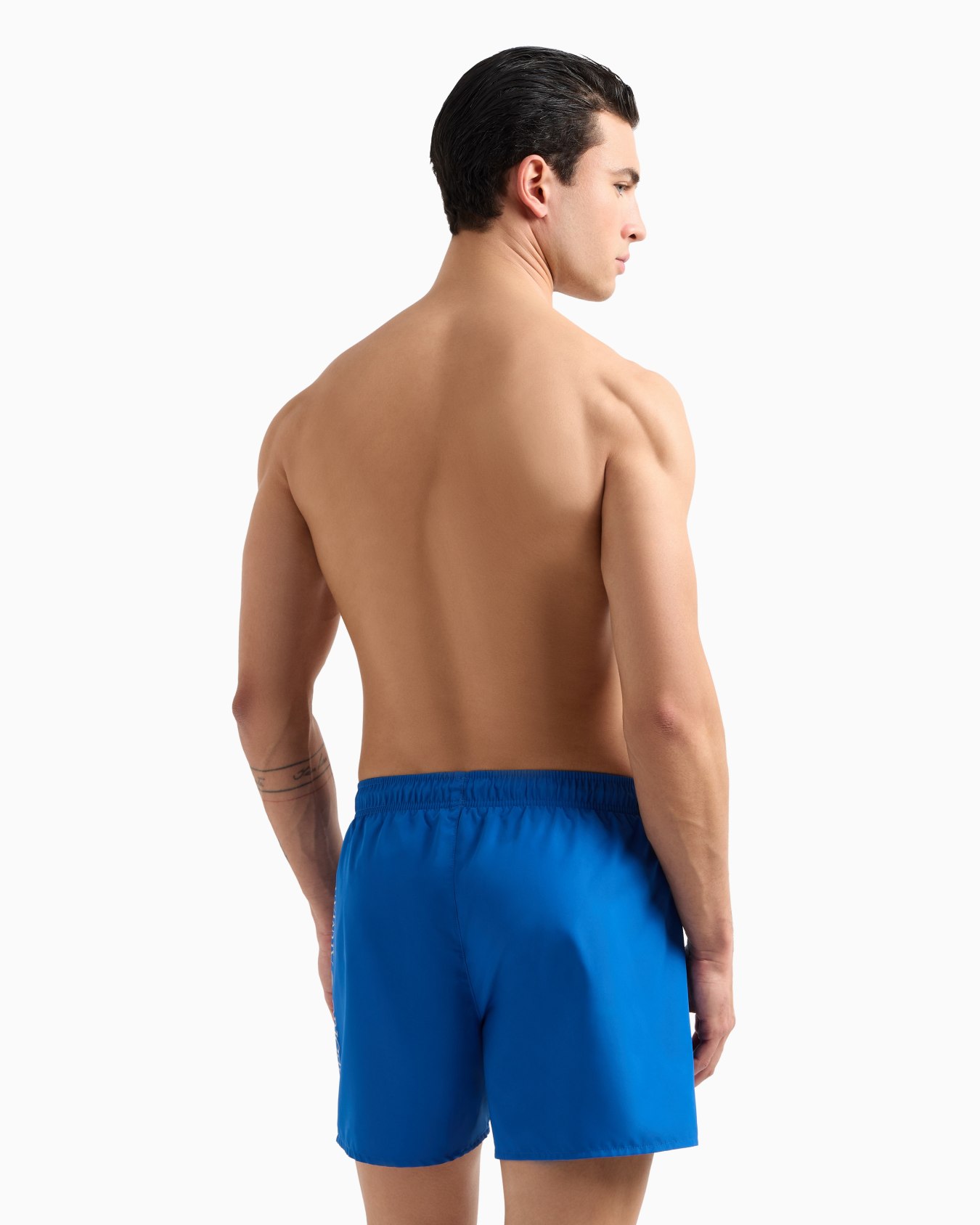 Swim trunks with oversized logo Slide 2