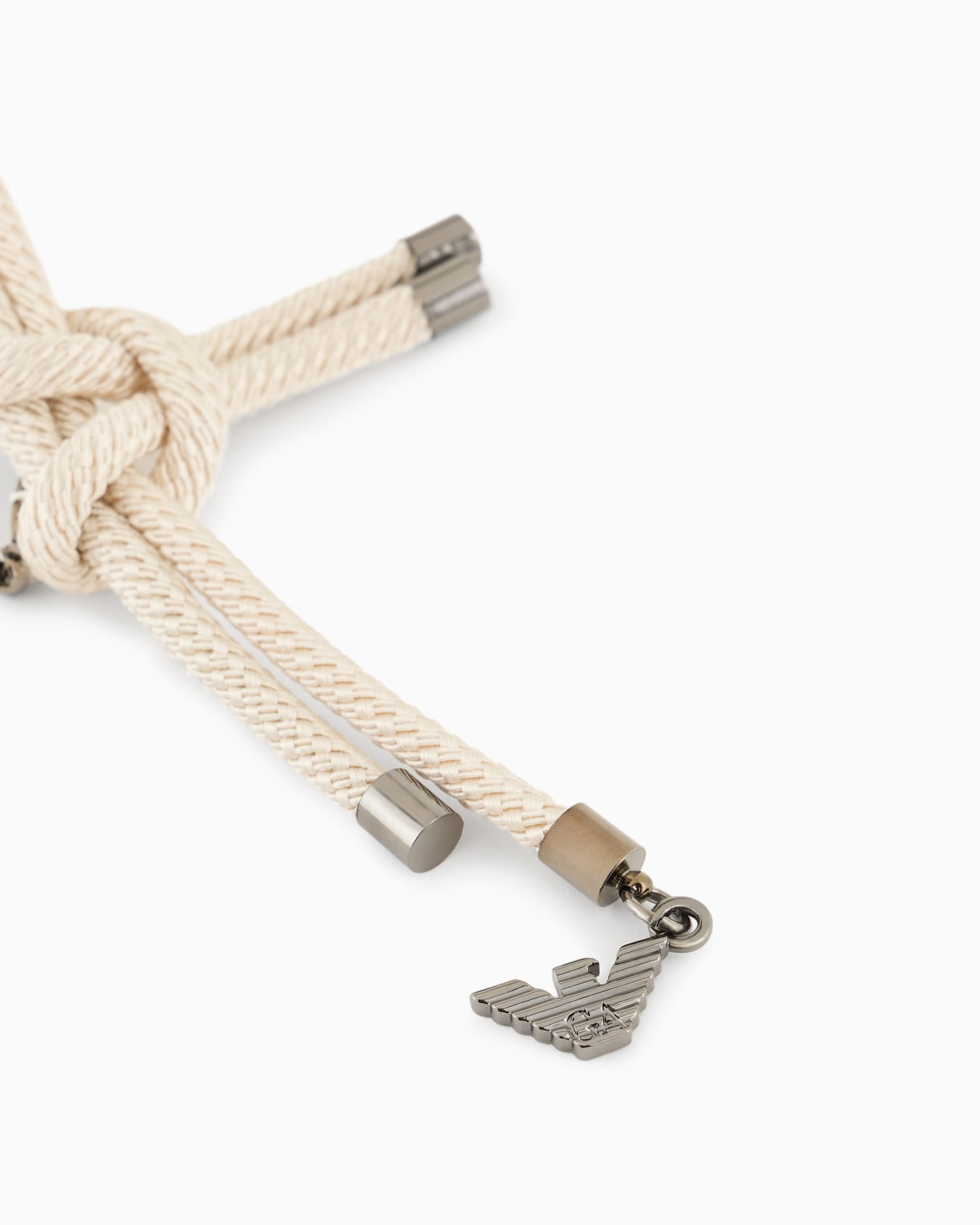 Cord brooch with twisting Slide 1