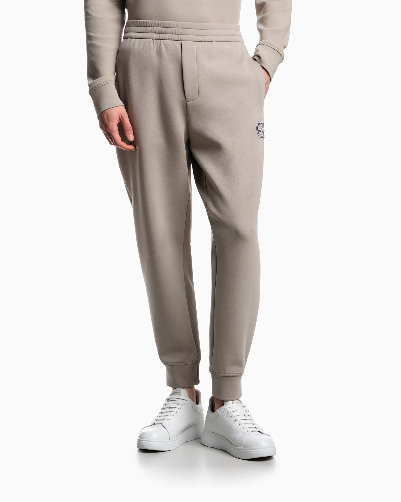 Double-jersey joggers with embossed embroidered EA logo Slide 3