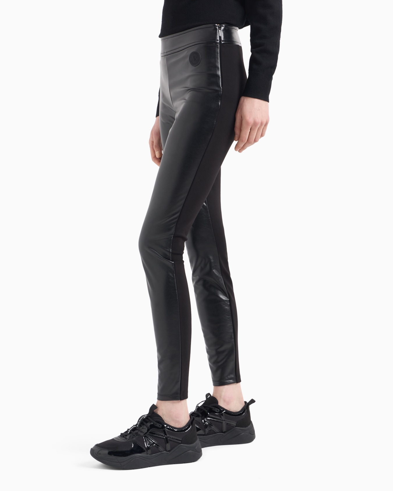 Skinny faux leather trousers with fabric inserts Slide 1