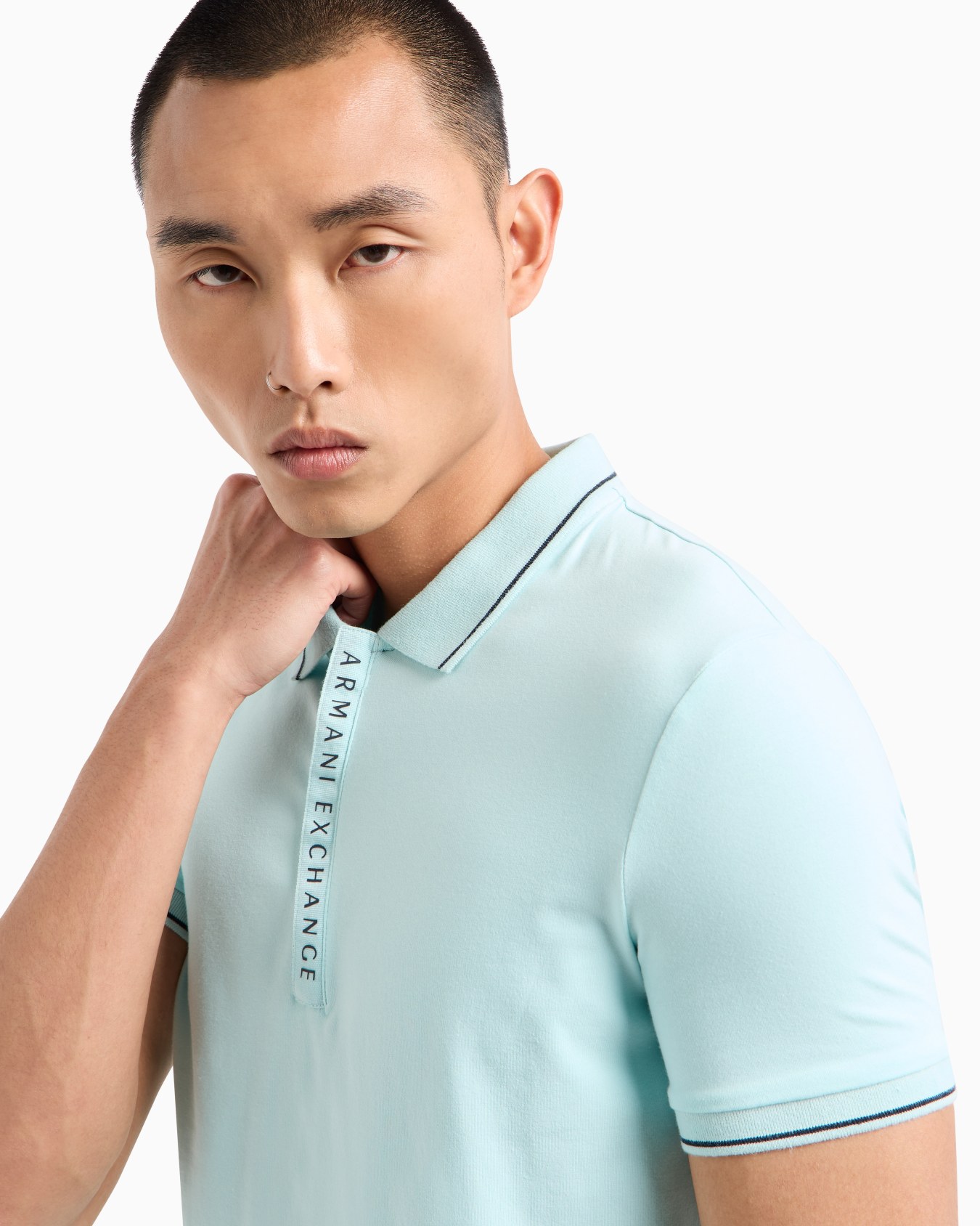 Polo with contrasting logo in cotton spandex Slide 4