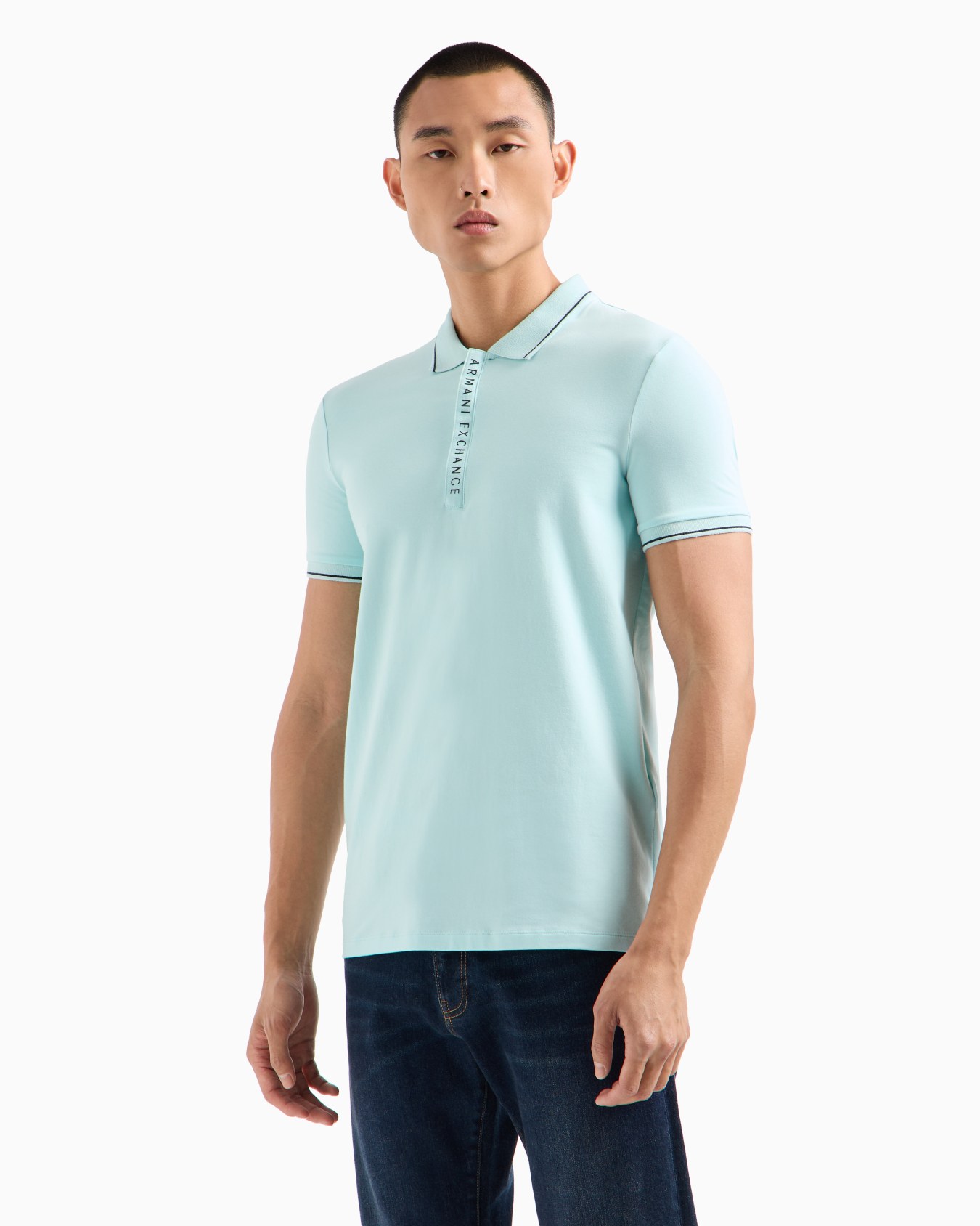 Polo with contrasting logo in cotton spandex Slide 1