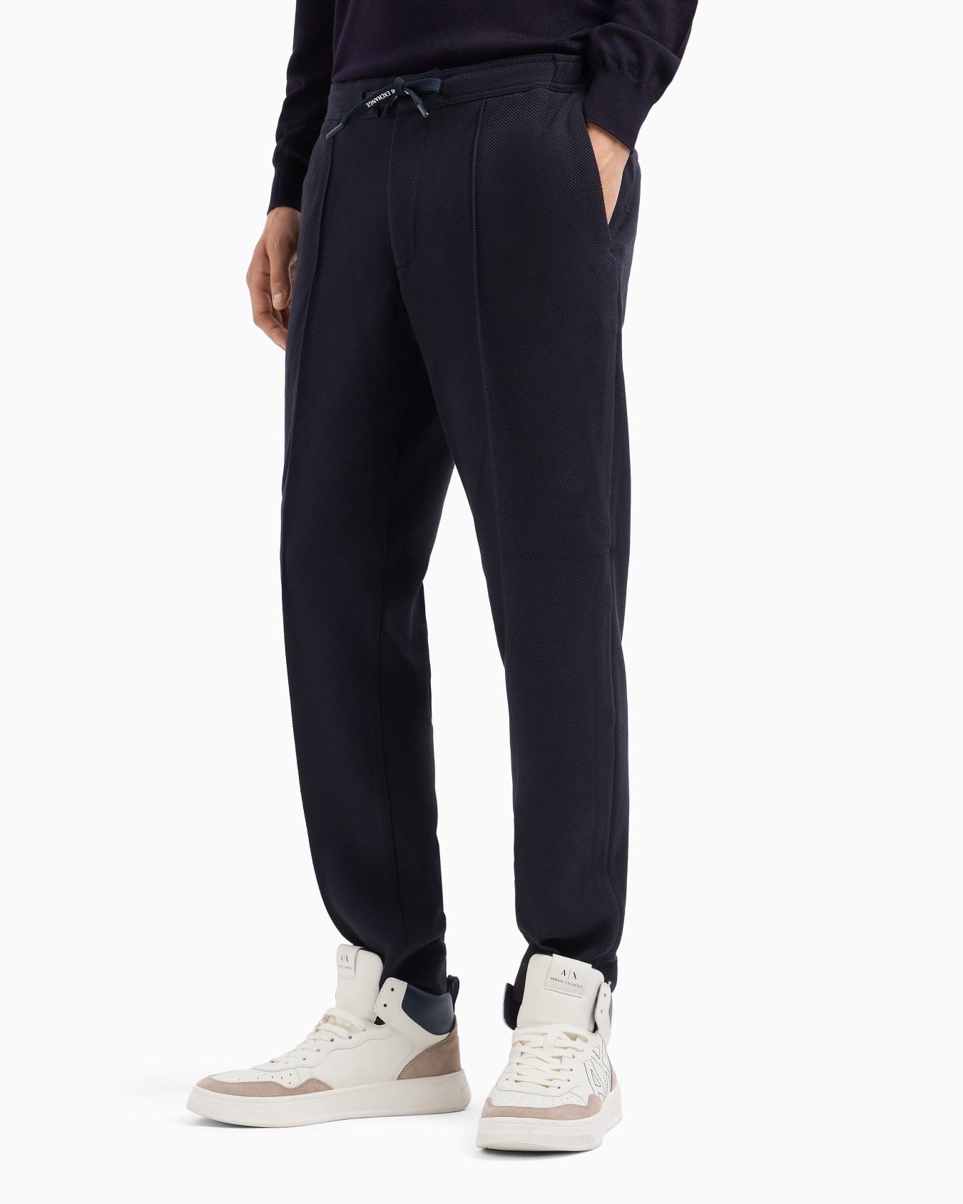 Straight fit trousers in textured fabric Slide 1