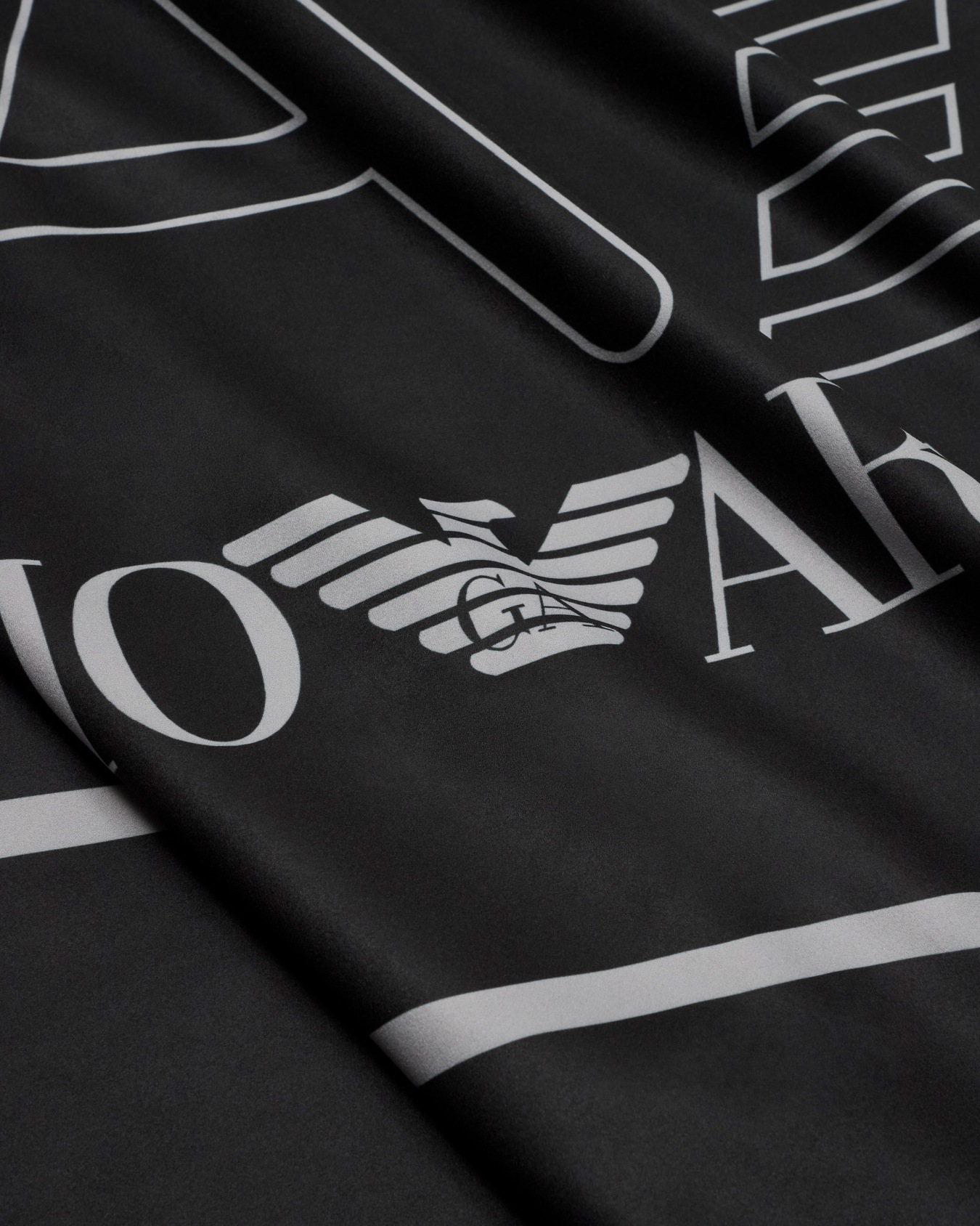 Microfibre beach towel with an oversized logo Slide 1