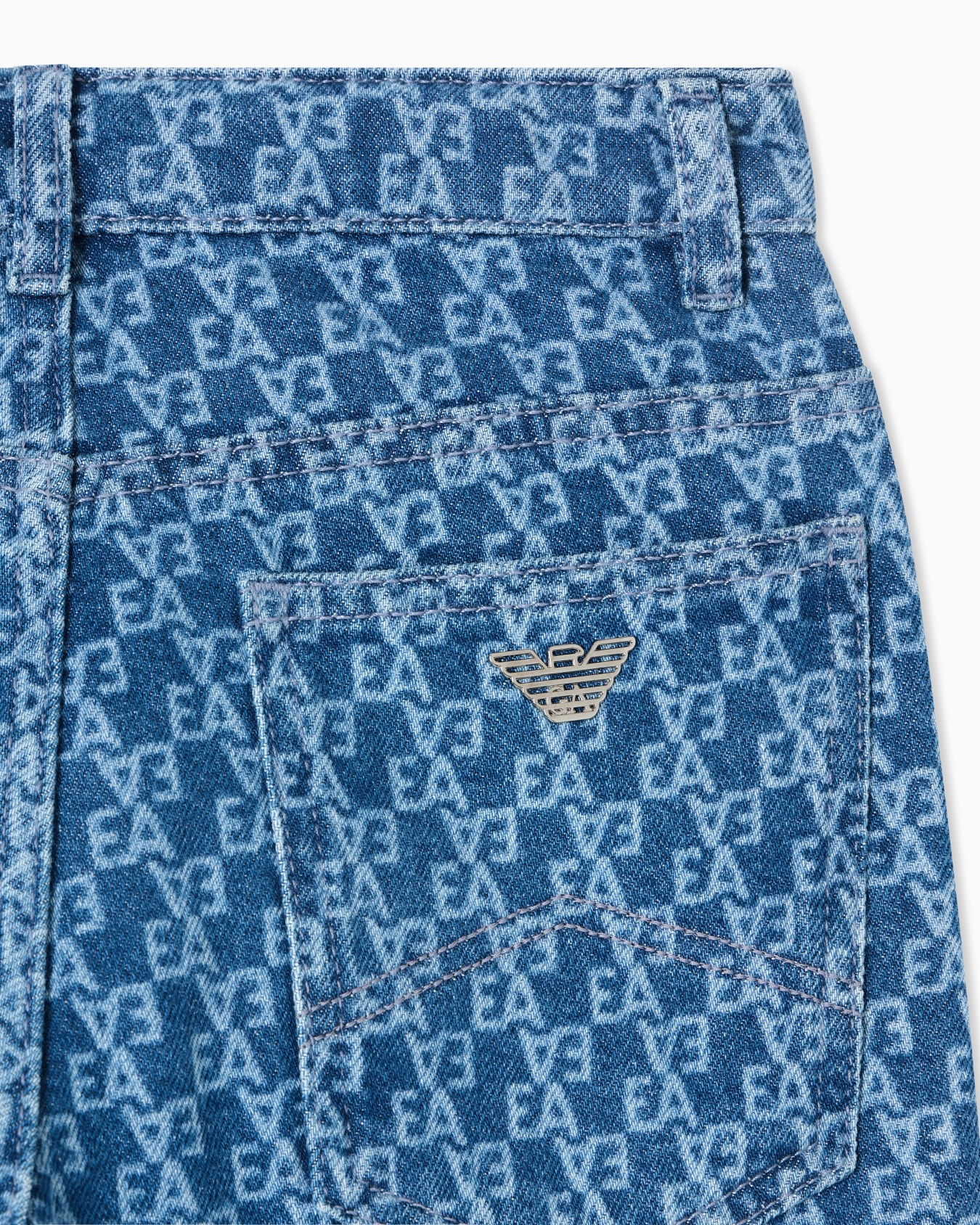 Carrot-fit denim jeans with all-over laser-cut lettering Slide 1