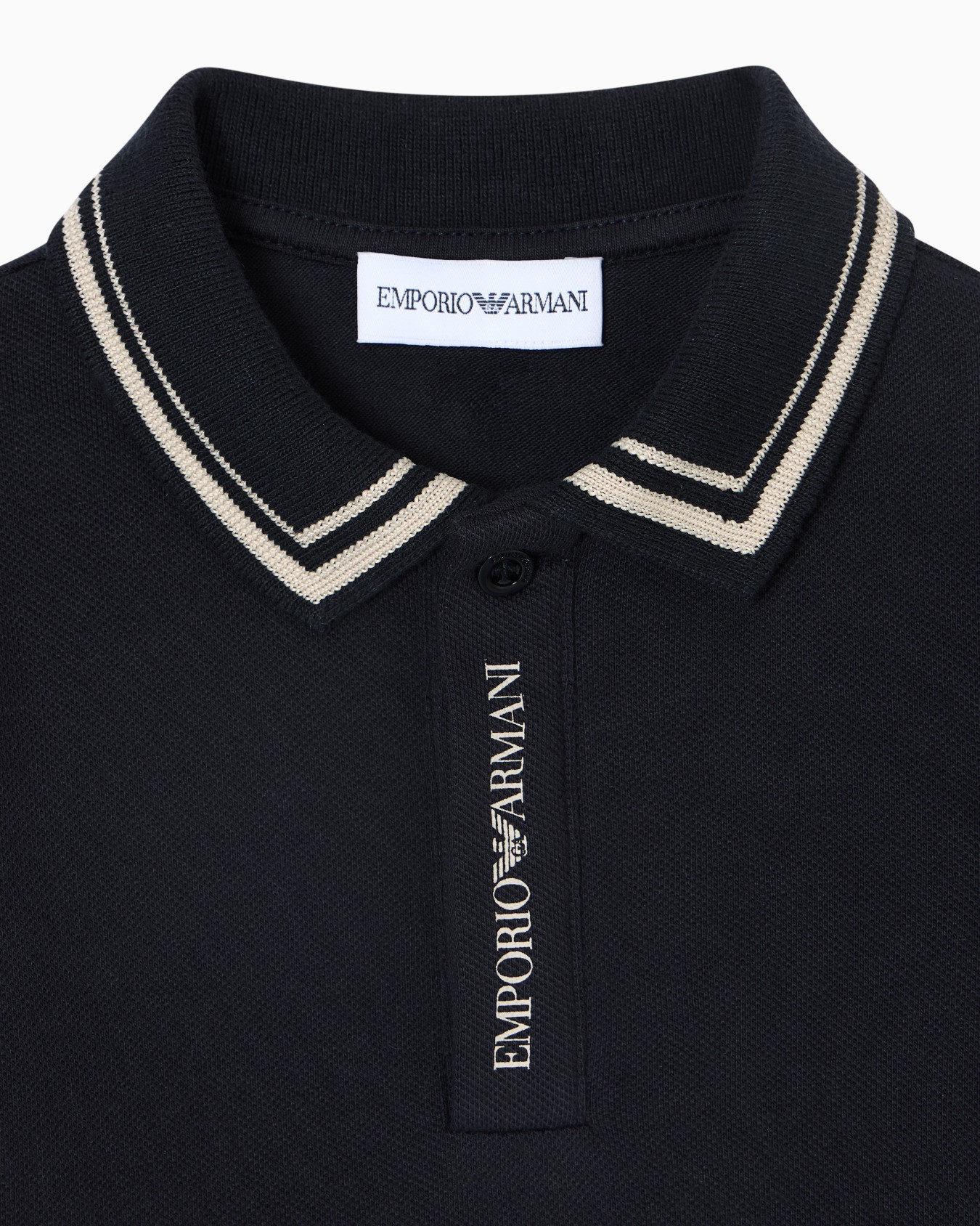 Piqué jersey polo shirt with piping detail Slide 1