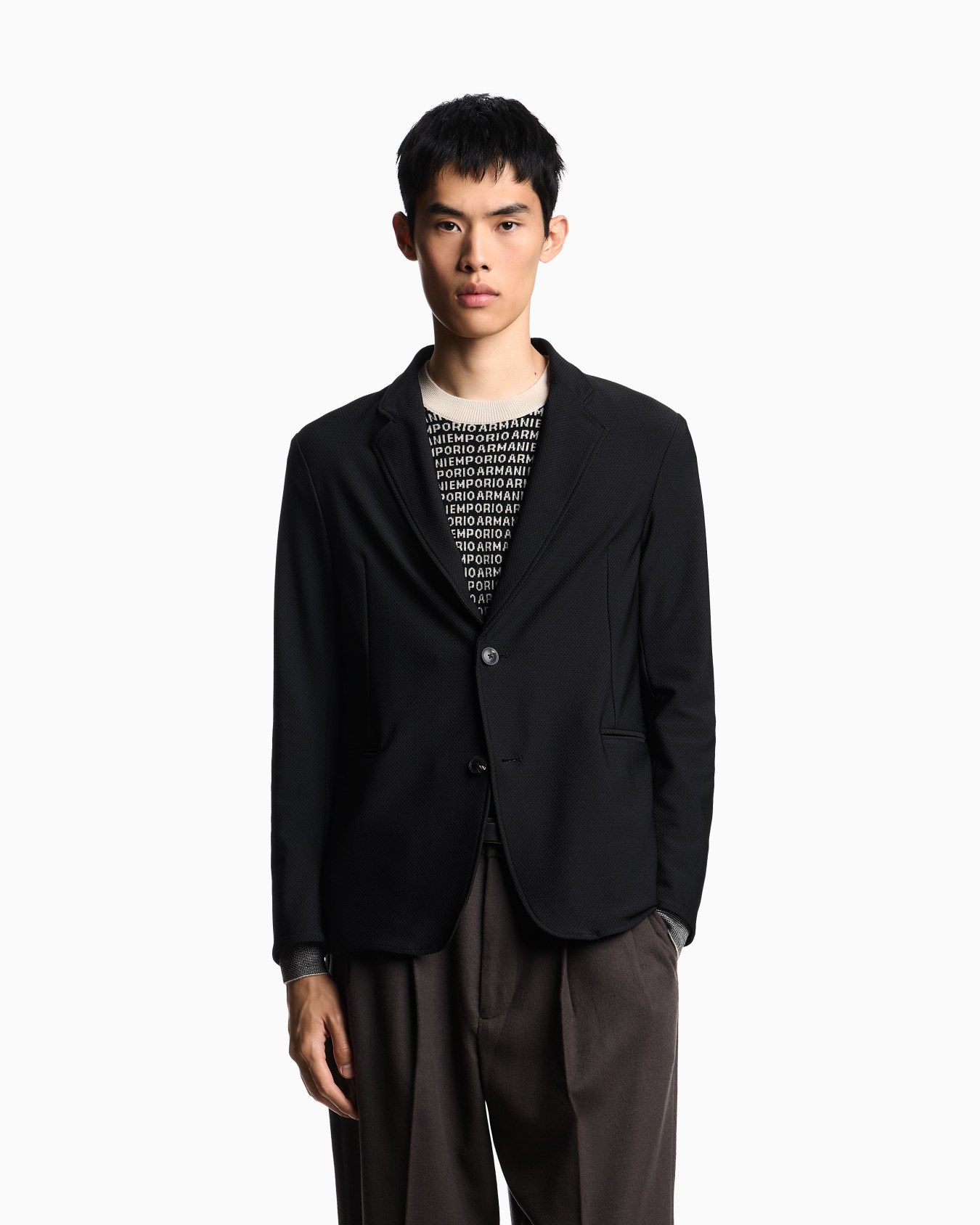 Single-breasted jacket in technical jersey with a 3D micro-textured effect Slide 3