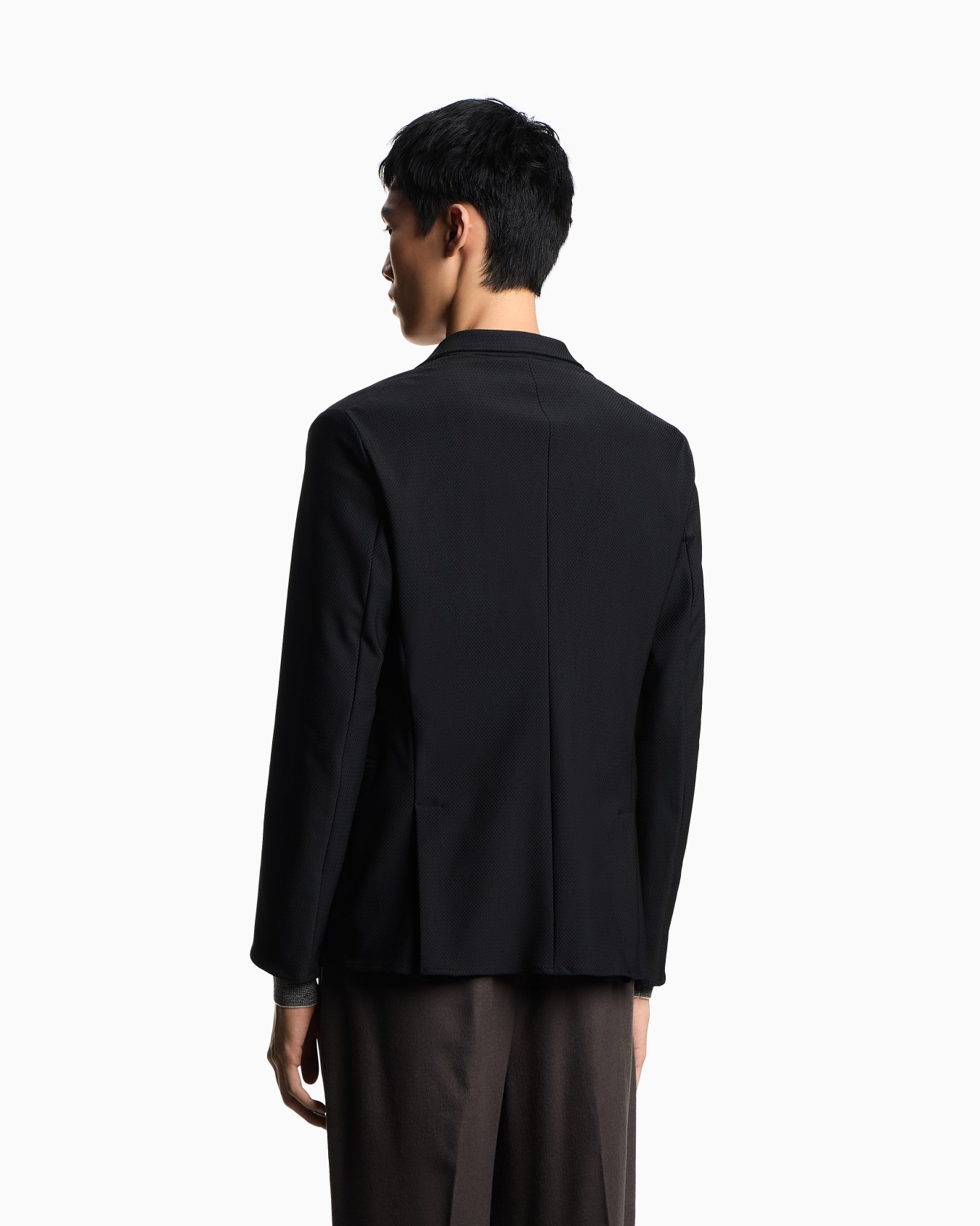 Single-breasted jacket in technical jersey with a 3D micro-textured effect Slide 2