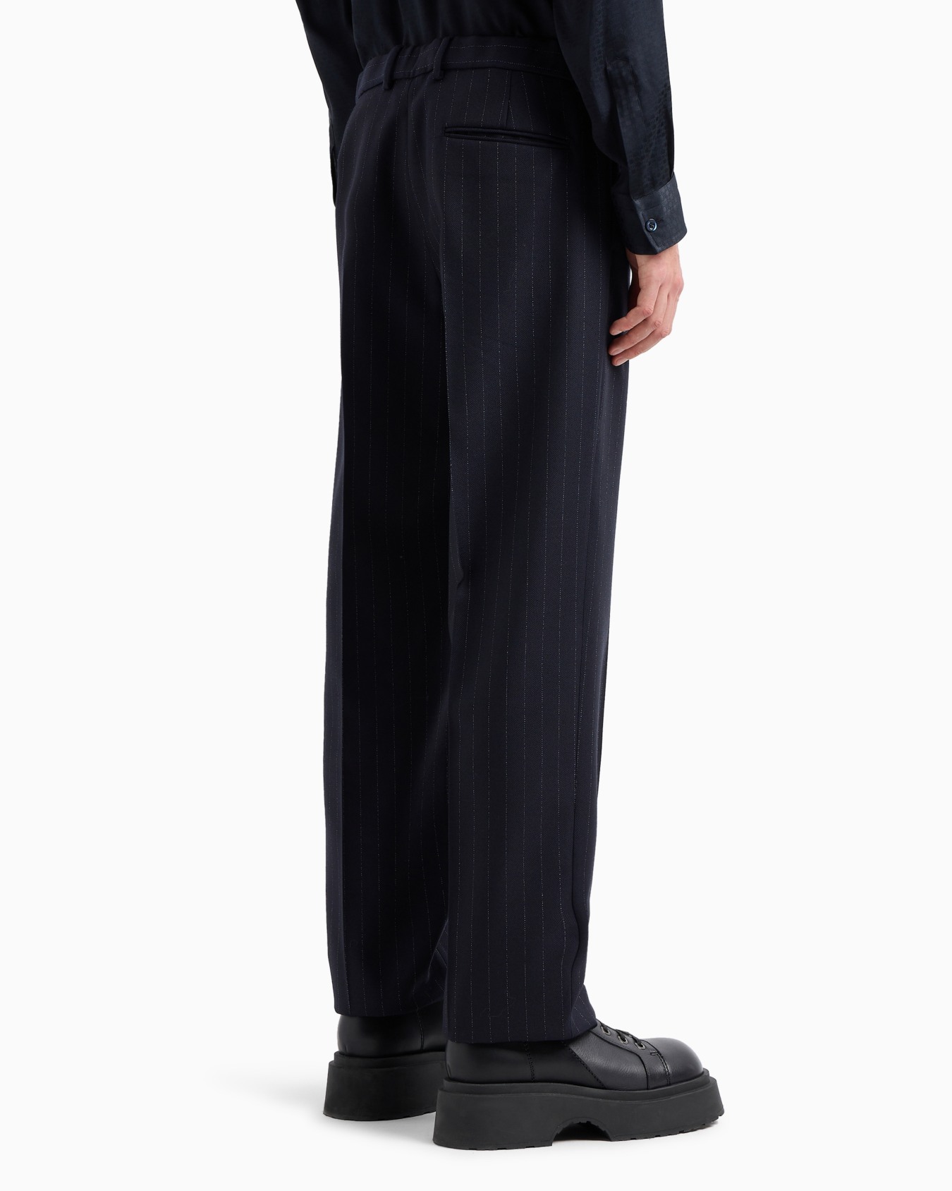 Pinstripe-motif compact virgin wool trousers with strap detail Slide 3