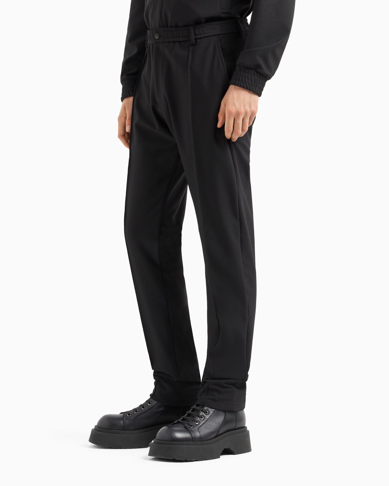 3D-effect micro-pattern technical-jersey trousers with ribbing Slide 1