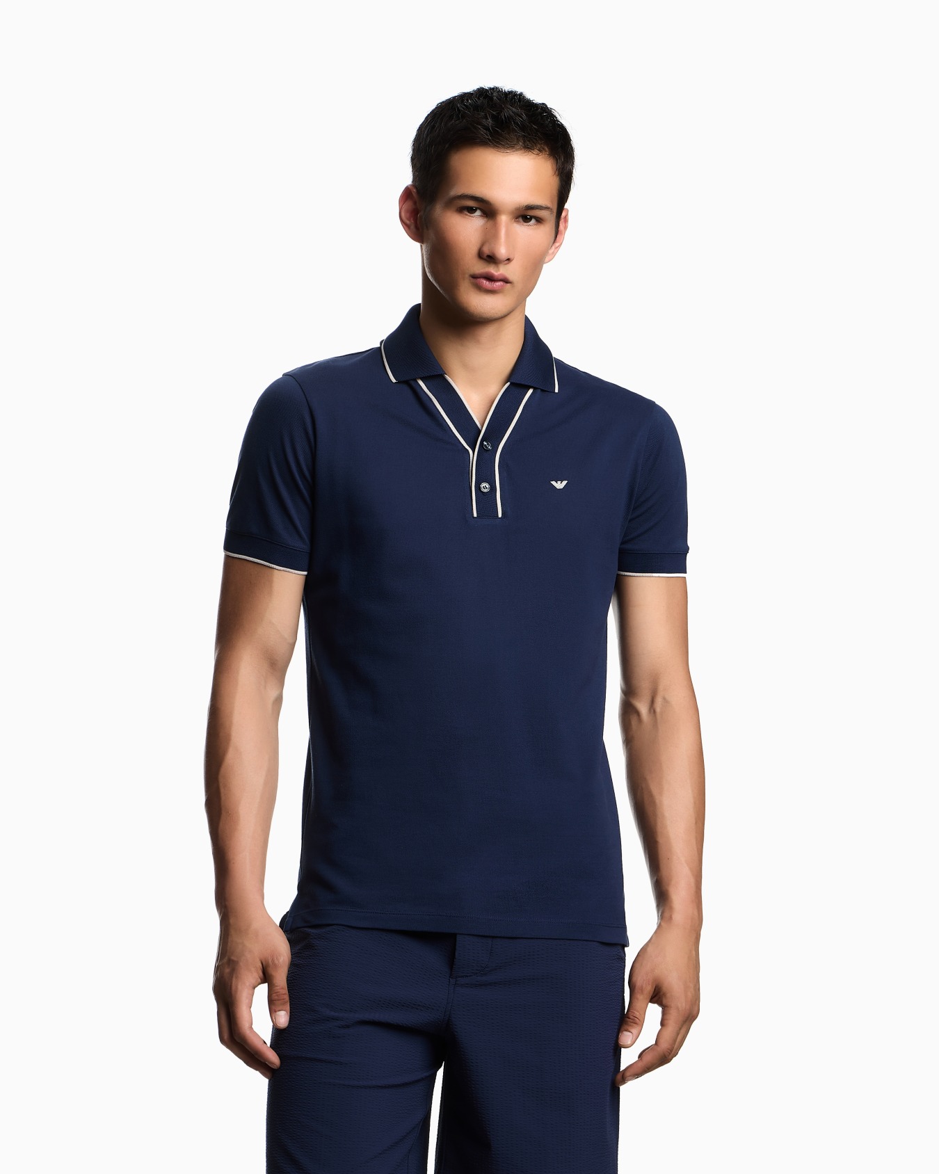 Piqué polo shirt with contrasting edges Slide 3