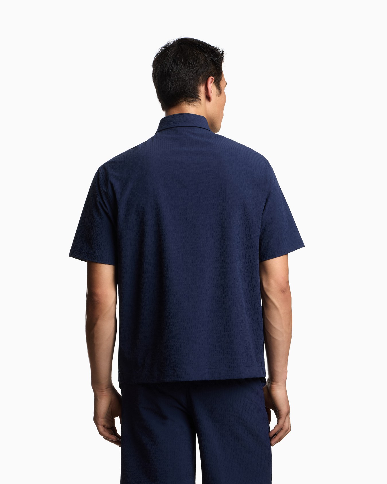 Piqué polo shirt with contrasting edges Slide 2