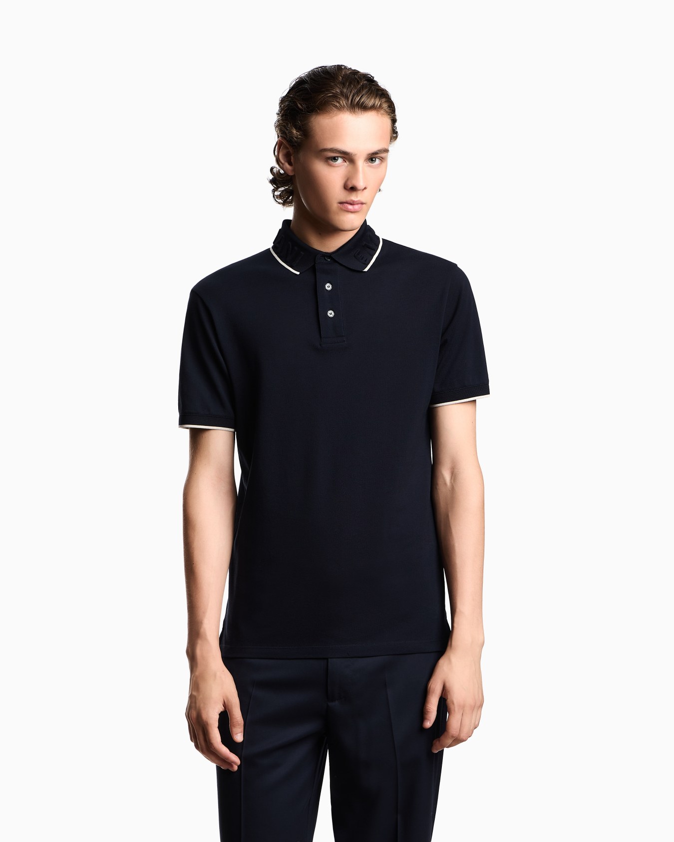 Piqué polo shirt with embossed logo collar Slide 3