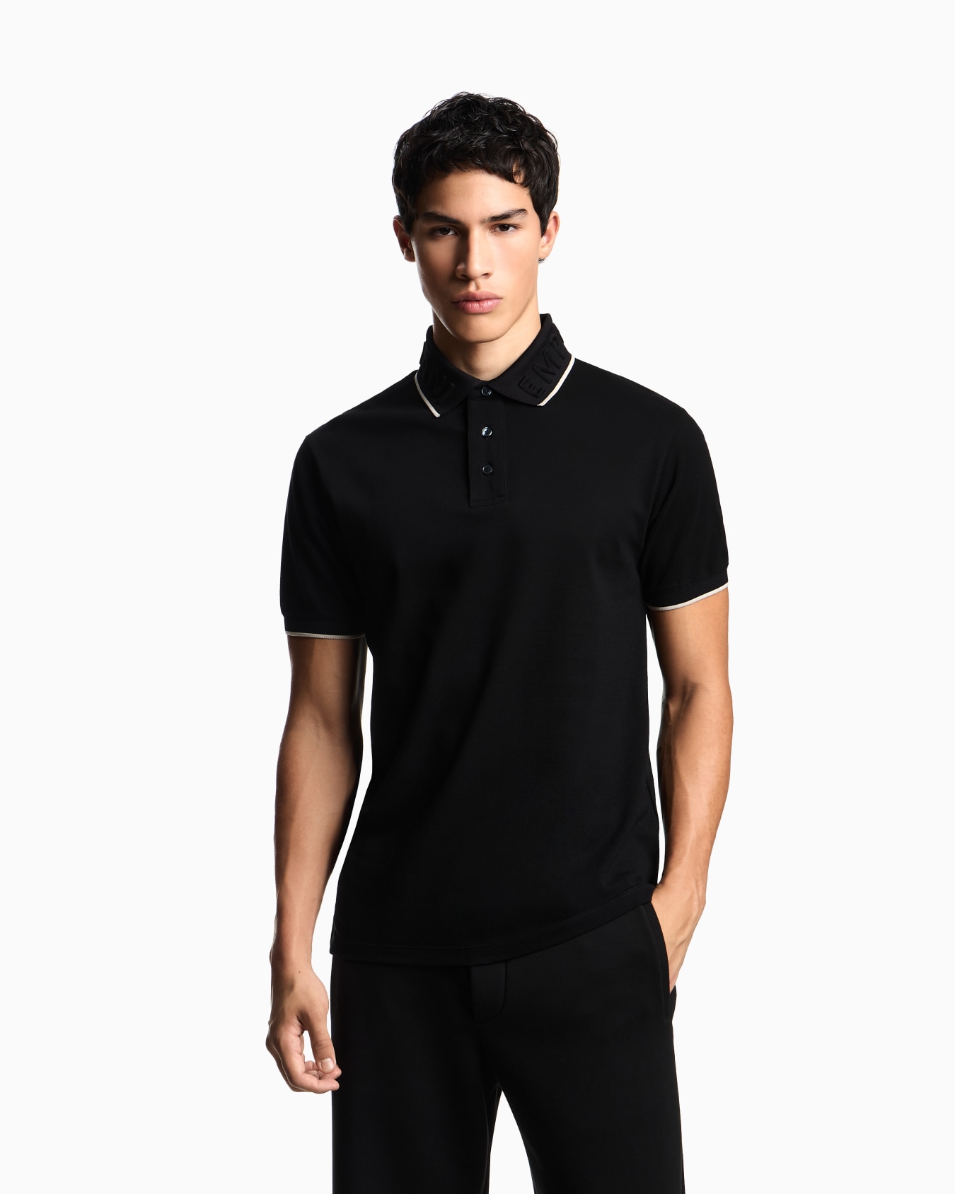 Piqué polo shirt with embossed logo collar Slide 3
