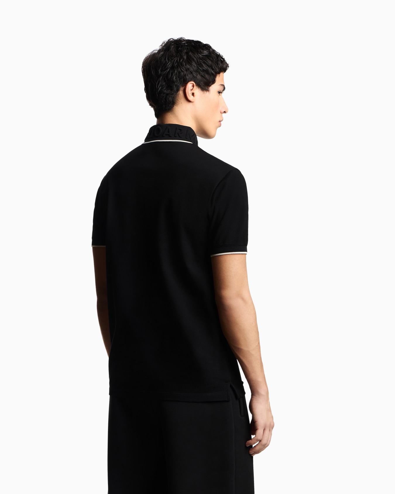 Piqué polo shirt with embossed logo collar Slide 2
