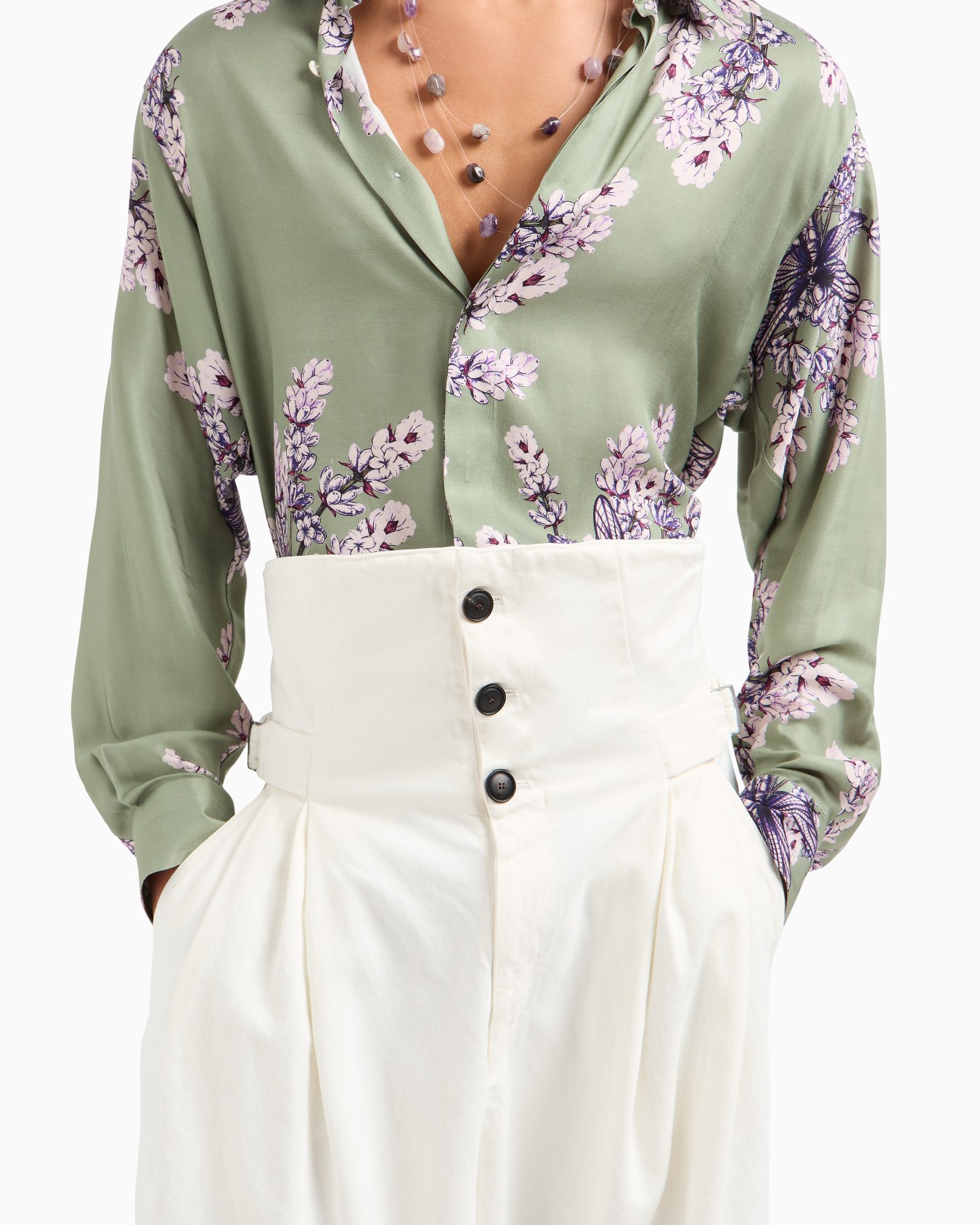 Destroyed-effect canvas trousers with peplum Slide 5