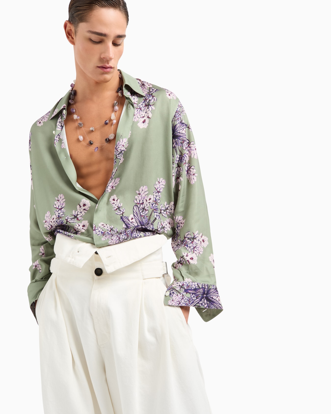 Destroyed-effect canvas trousers with peplum Slide 6