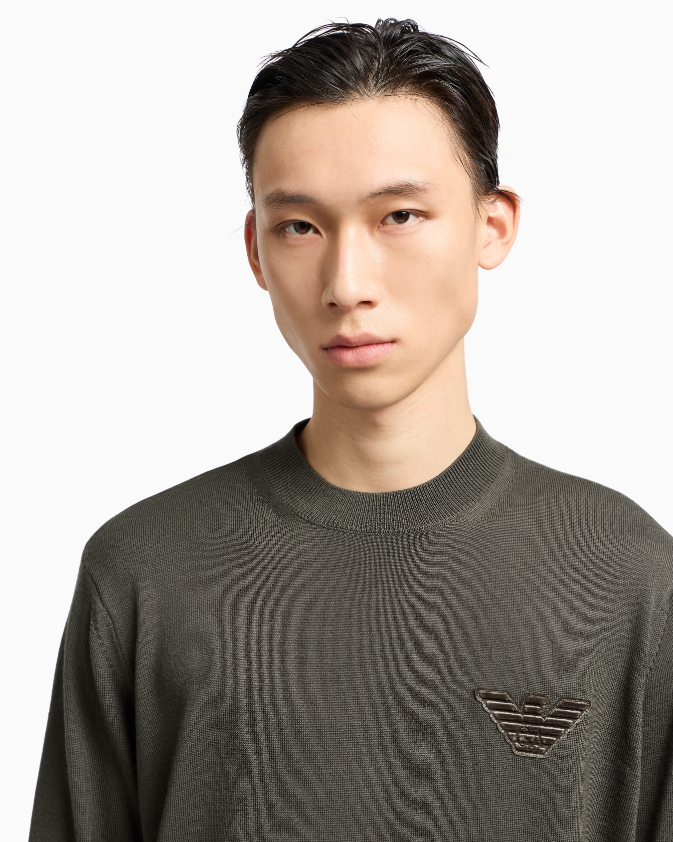 Plain-knit virgin-wool jumper with eagle patch Slide 5