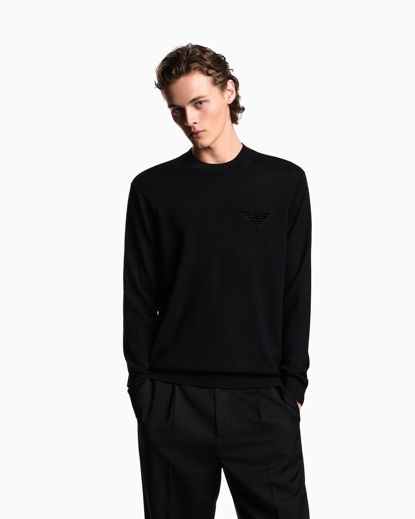 Plain-knit virgin-wool jumper with eagle patch Slide 3