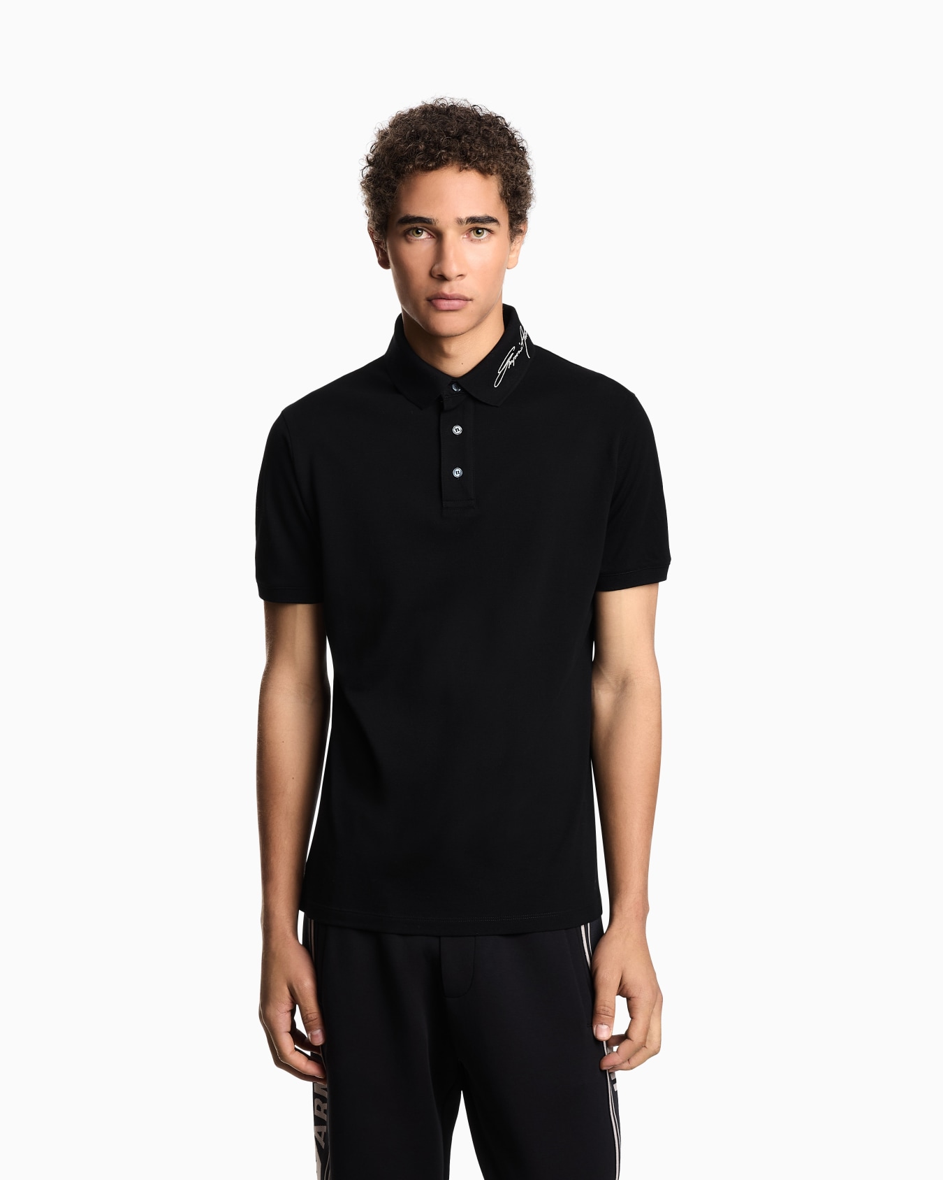 Piqué polo shirt with signature logo embroidery on the collar Slide 3