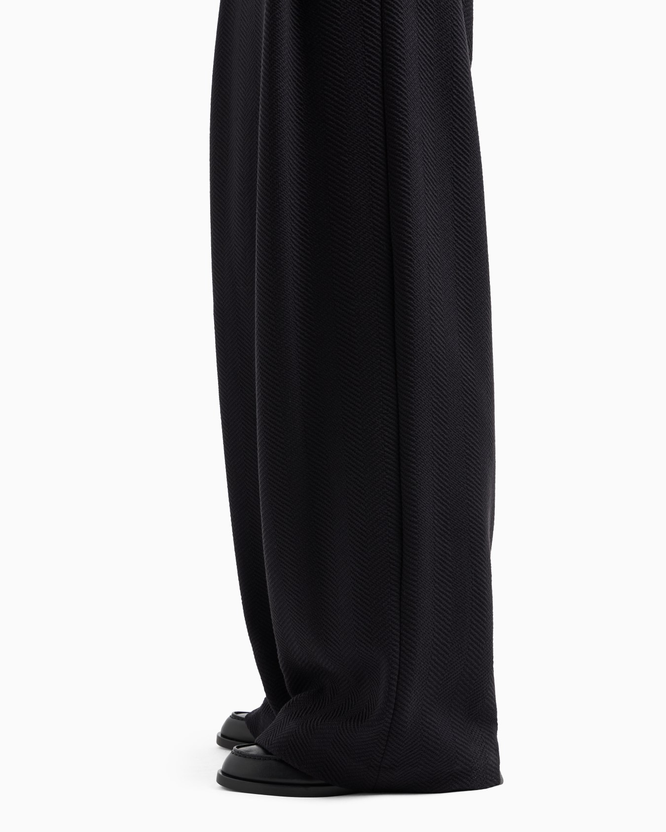 Icon jacquard jersey knit trousers with an embossed chevron design Slide 3