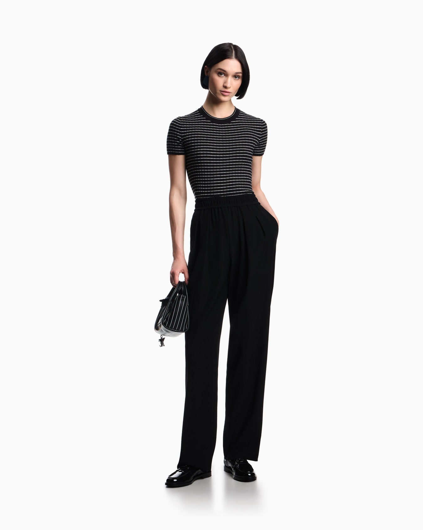 Technical-cady trousers with elasticated waistband Slide 1