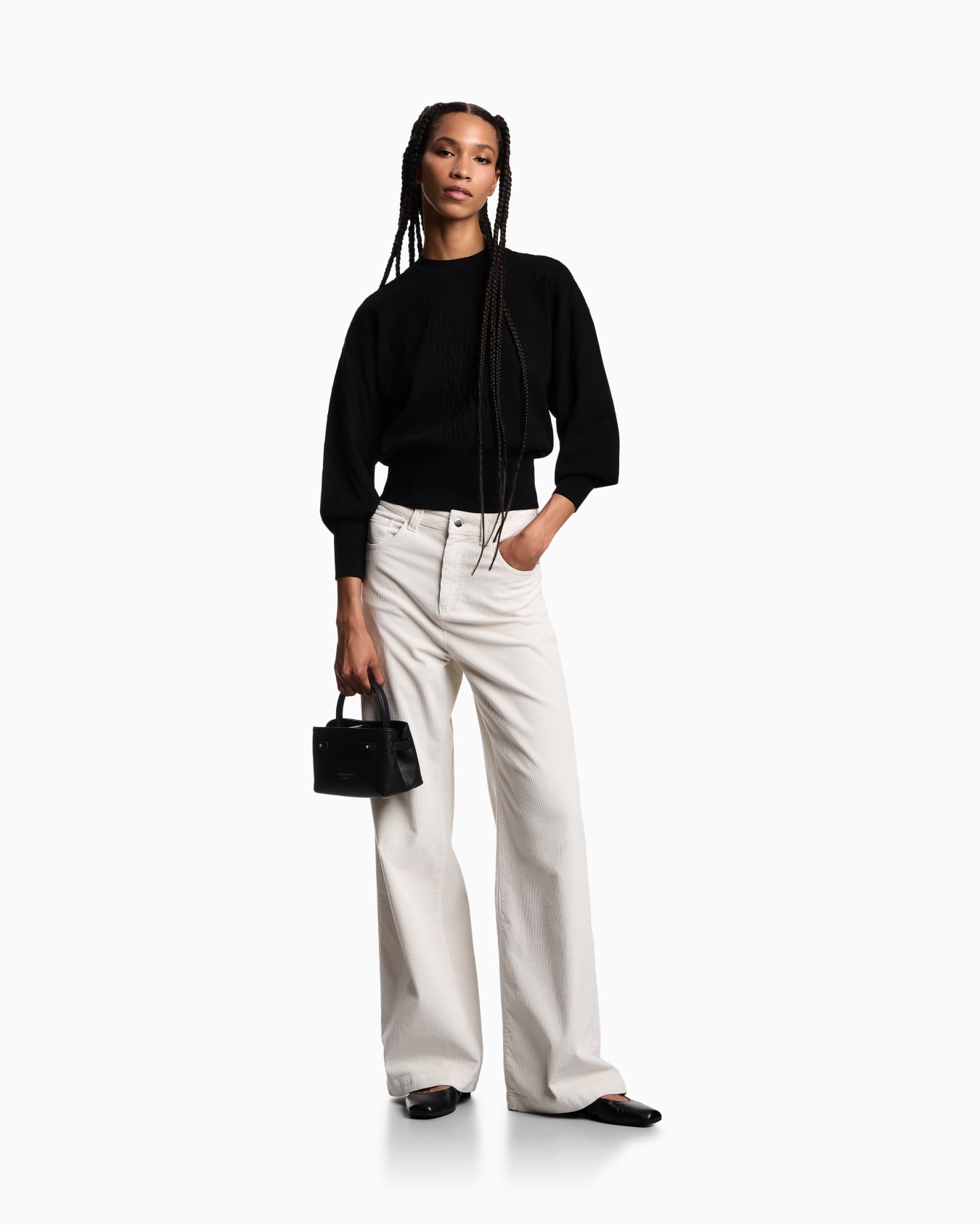 Travel Essentials capsule collection viscose-blend jumper with an embossed motif Slide 1