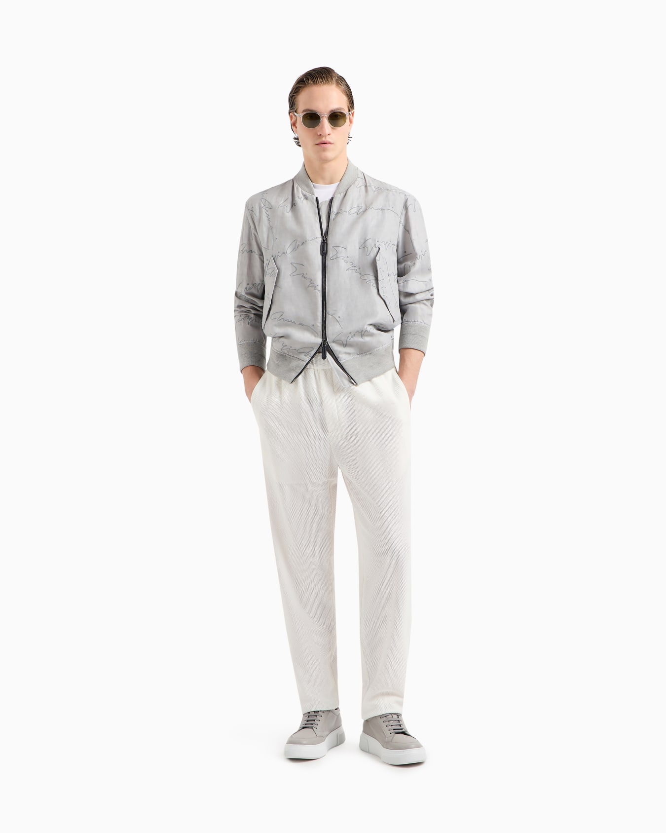 Pantalones sin pinzas de tejido gofrado técnico Diapositiva 1