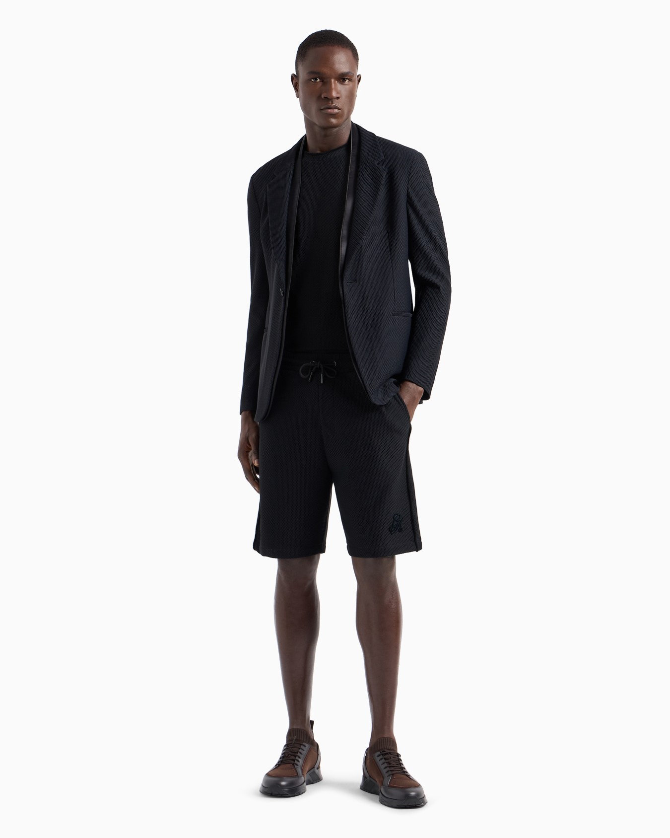 Single-breasted jacket in technical waffle fabric Slide 3