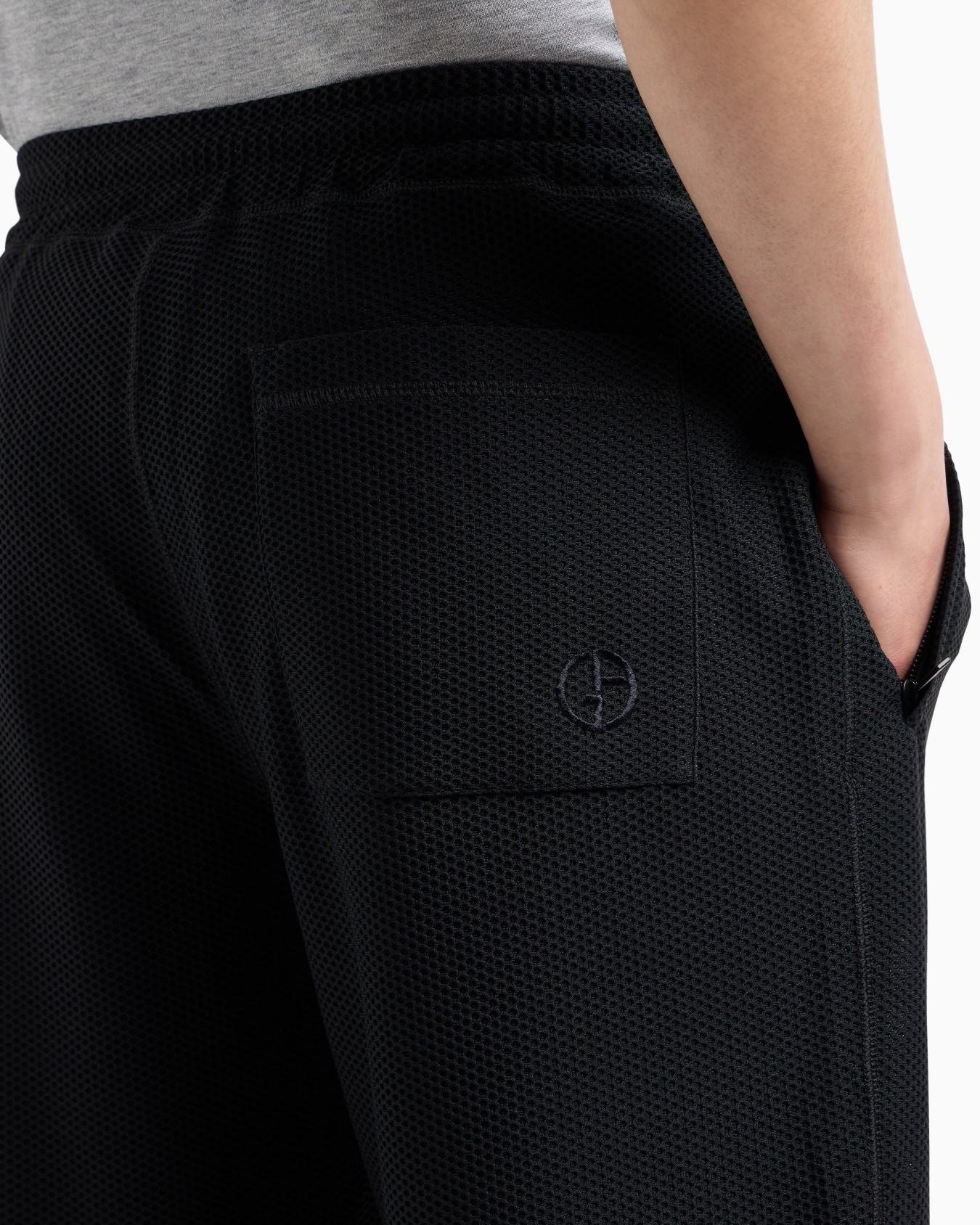 Joggers in technical waffle fabric Slide 4