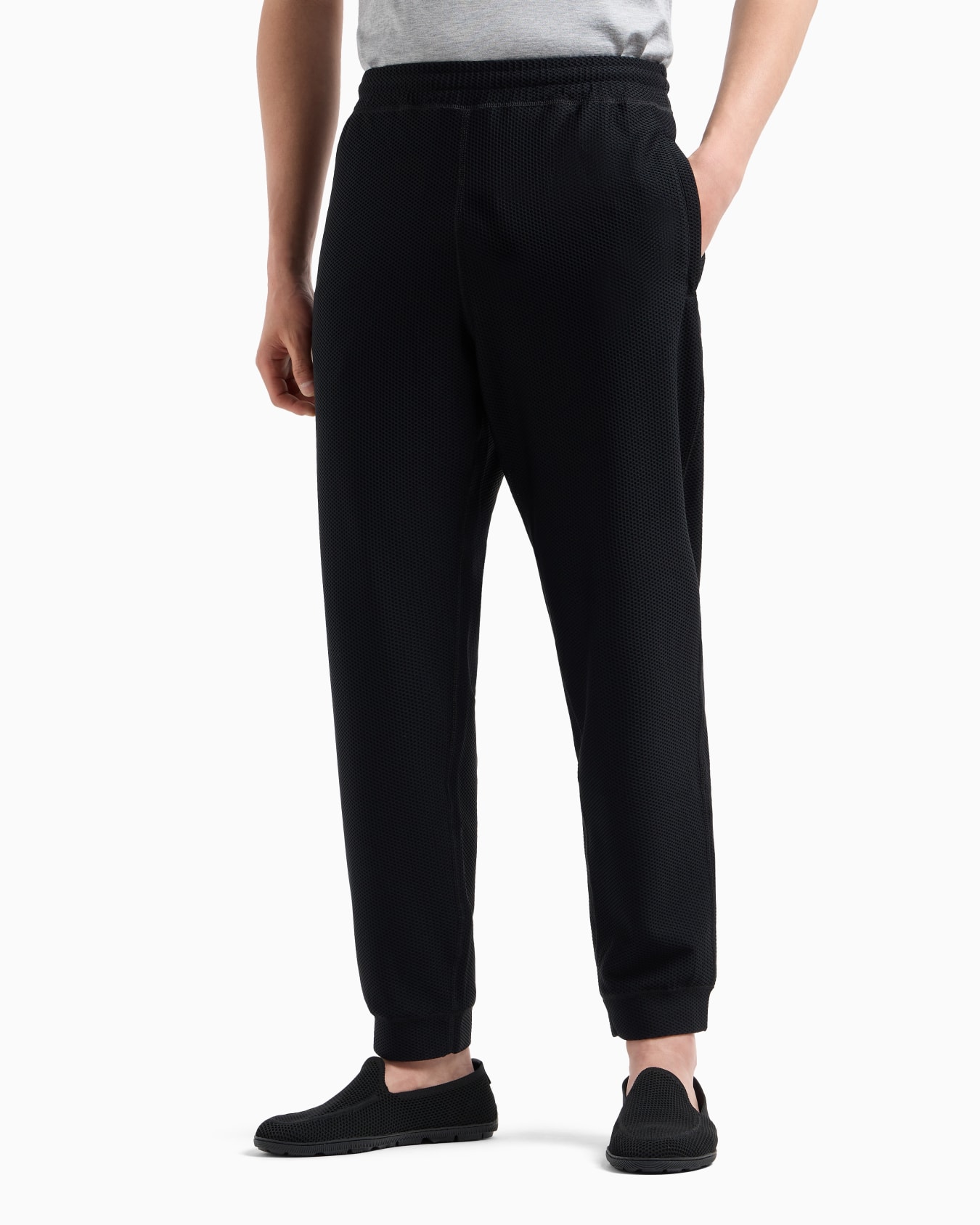 Joggers in technical waffle fabric Slide 3