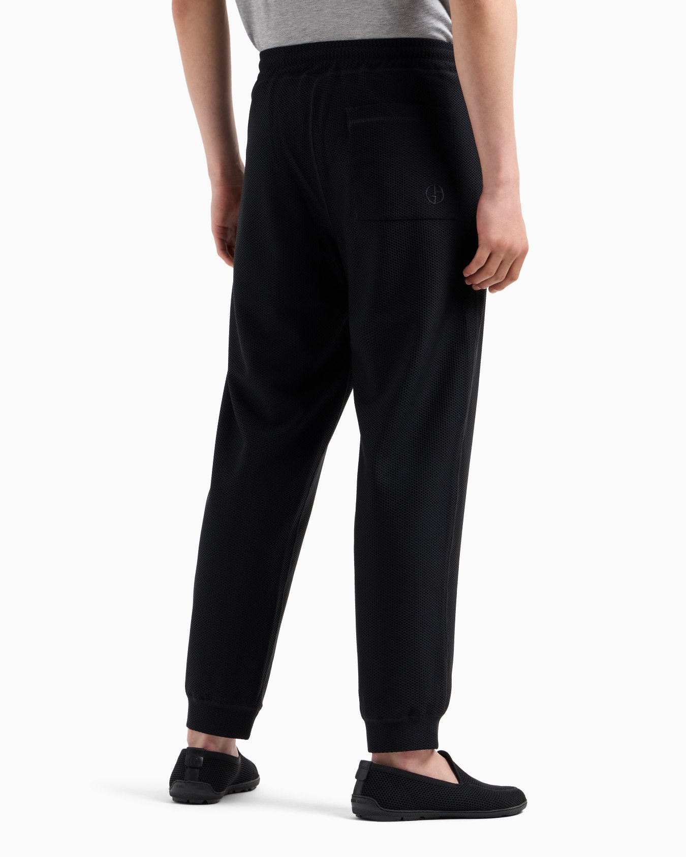 Joggers in technical waffle fabric Slide 2