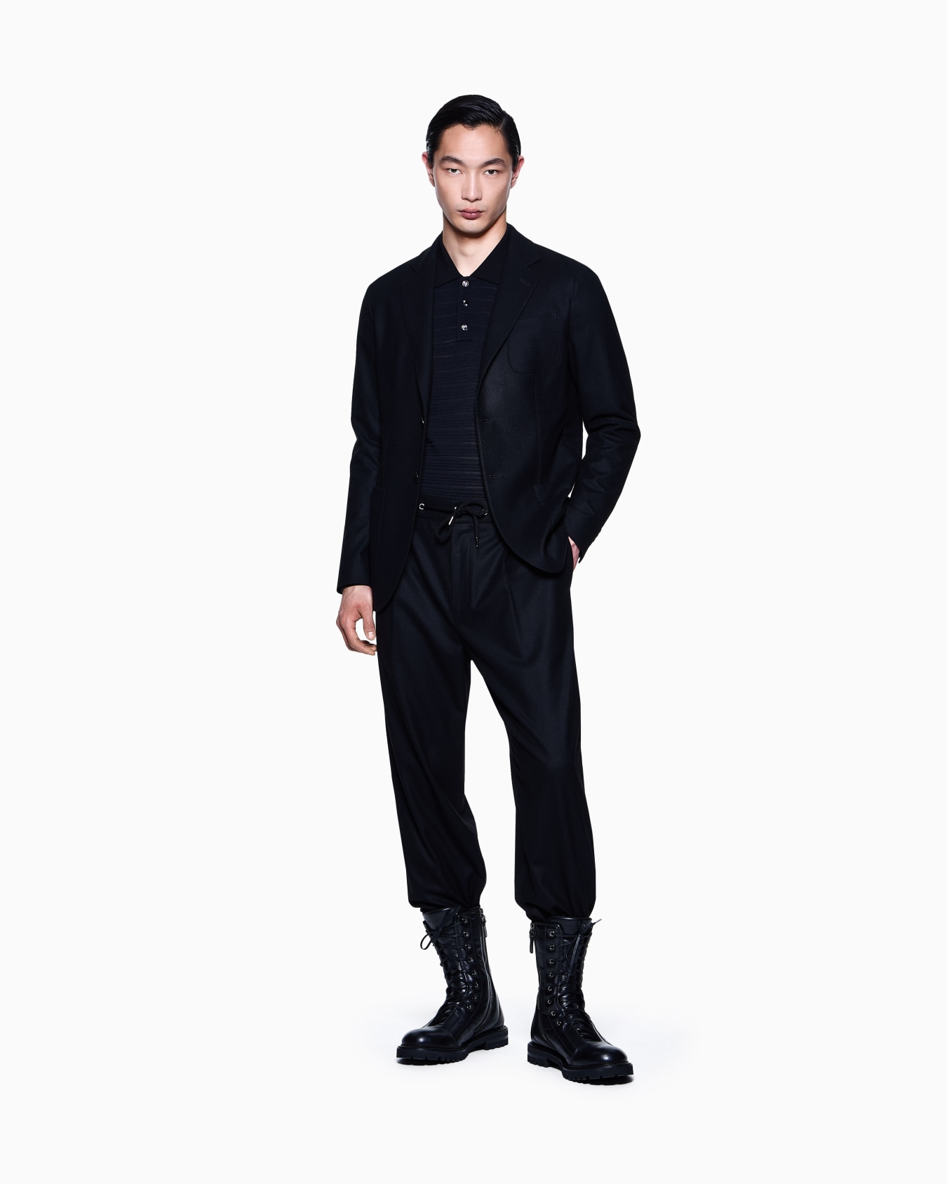 Long-sleeved polo shirt in wool jersey with a stripe motif Slide 1