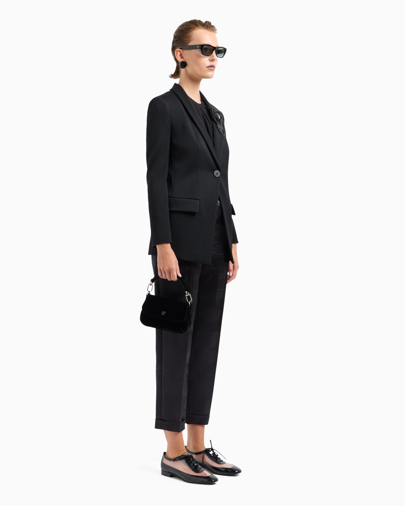 Straight-cut, one-pleat trousers in fluid wool with a Prince of Wales check motif Slide 3