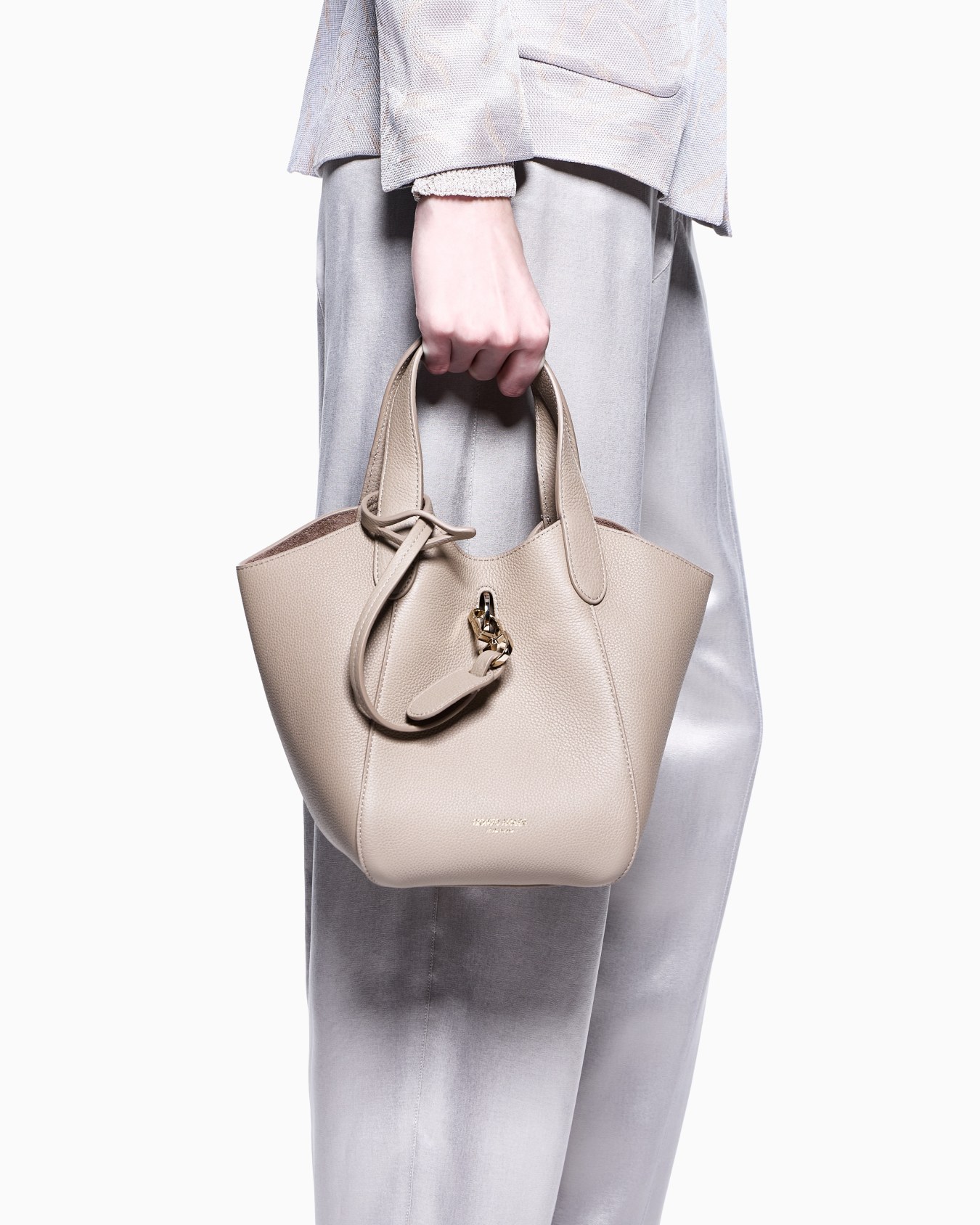 Small pebbled leather handbag Slide 5