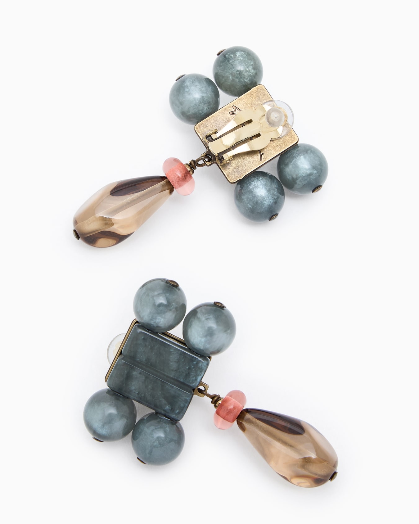 Resin and quartz clip-on earrings Slide 1