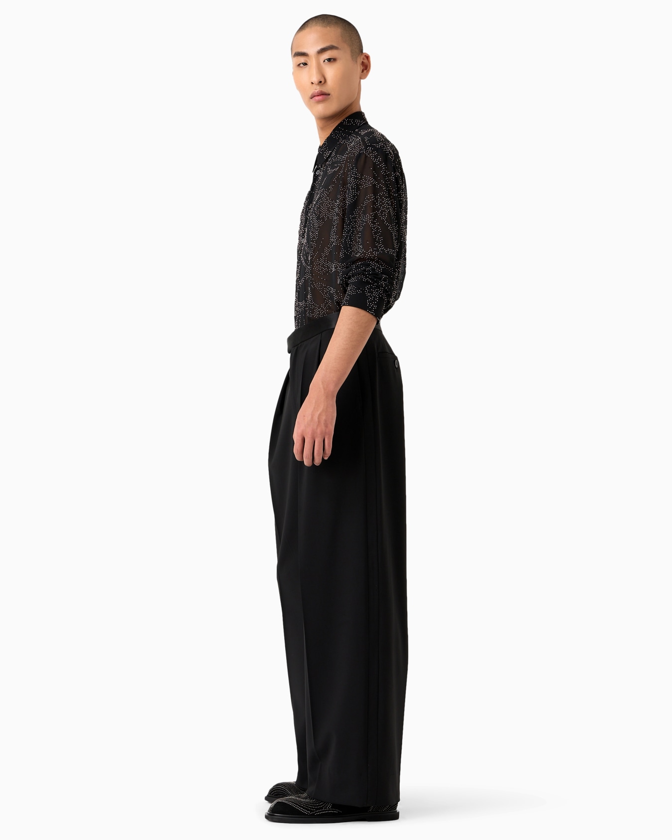 Pantaloni con pieghe godet in tela bi-stretch di lana vergine Slide 4